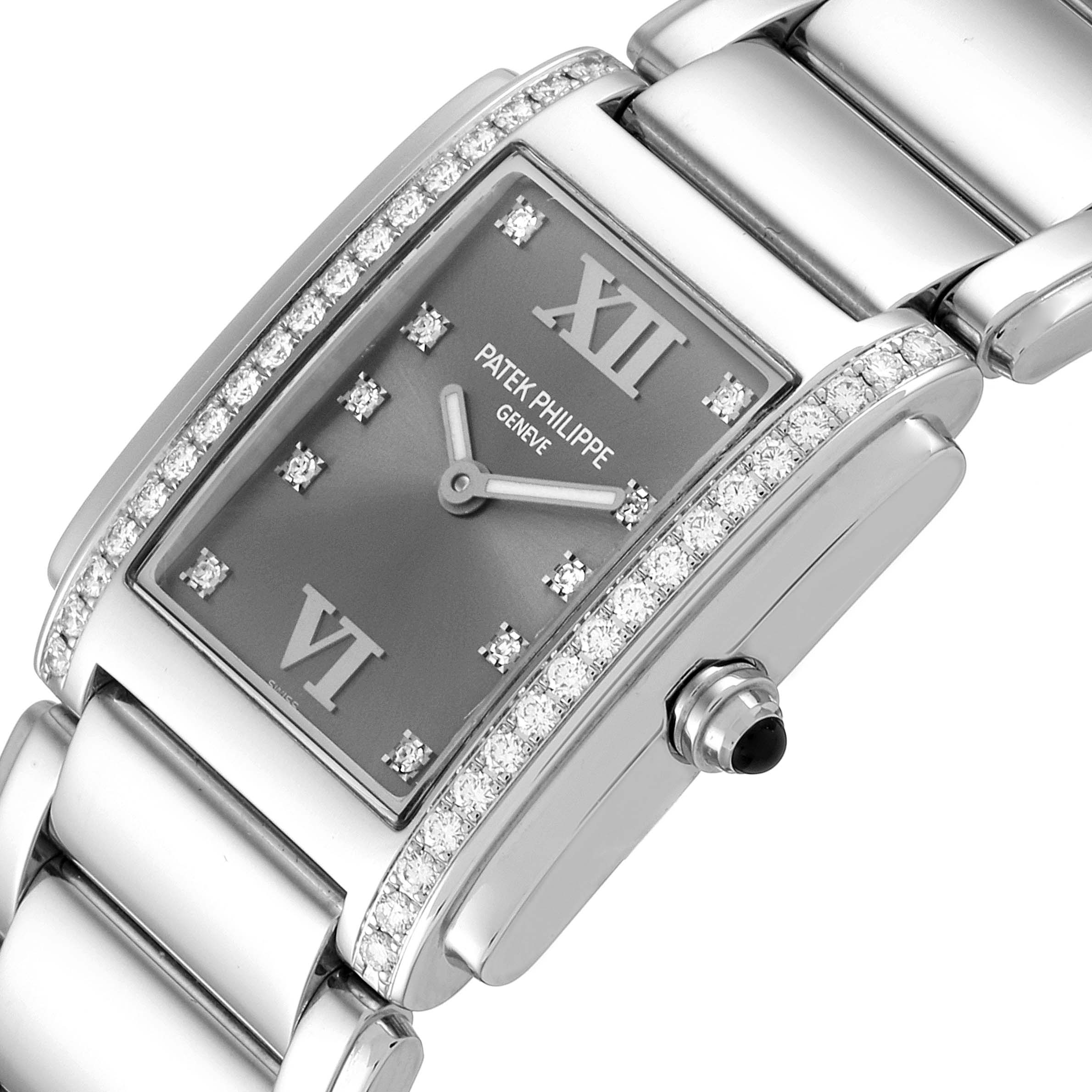 The image shows a close-up of the Patek Philippe Twenty-4 4910/10A-010 Women's Stainless Steel Grey Dial 4910/10A-010 Women's Stainless Steel Grey Dial watch face, bracelet, and side crown.
