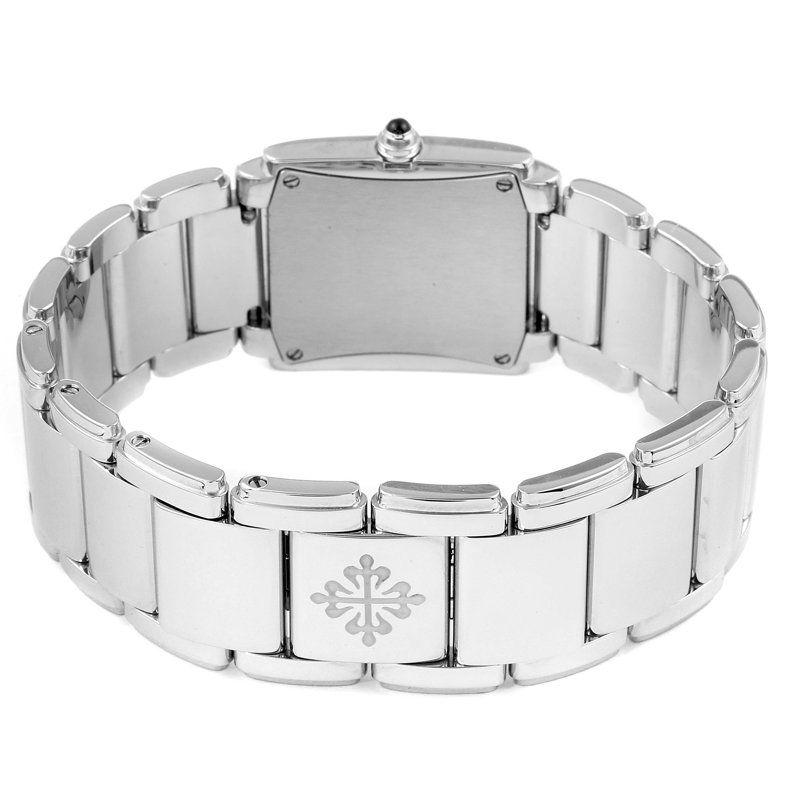 The image shows the back view of a Patek Philippe Twenty-4 4910/10A-010 Women's Stainless Steel Grey Dial 4910/10A-010 Women's Stainless Steel Grey Dial model watch, highlighting the clasp and bracelet links.