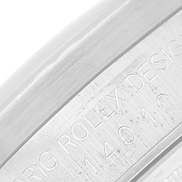 The image shows a close-up angle of the outer rim of an Air-King model by Rolex, highlighting the engraved text.