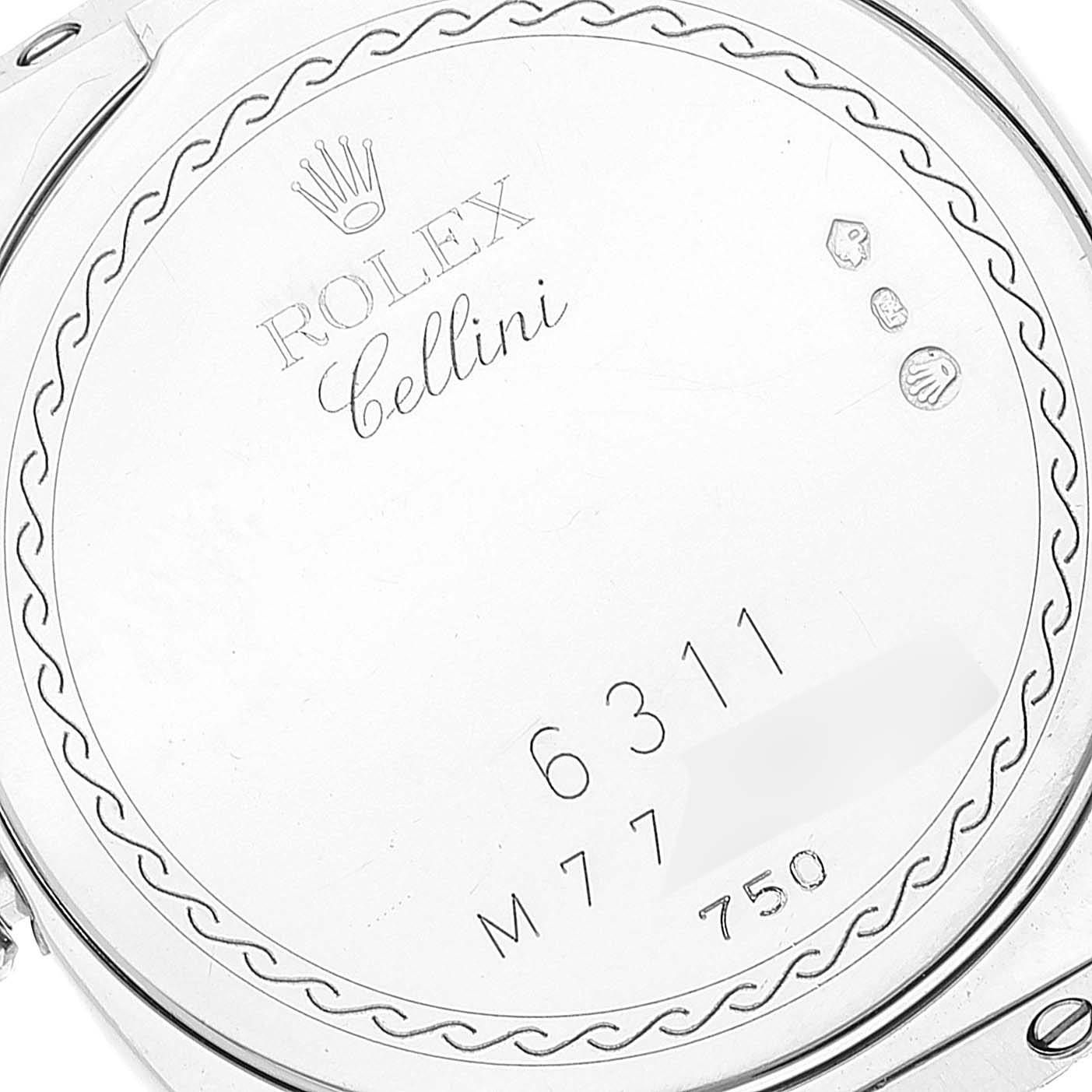 This is an image of the back case of a Rolex Cellini 6311 Women's White Gold Mother of Pearl Dial 6311 Women's White Gold Mother of Pearl Dial watch, showing the brand, model name, and various engravings.