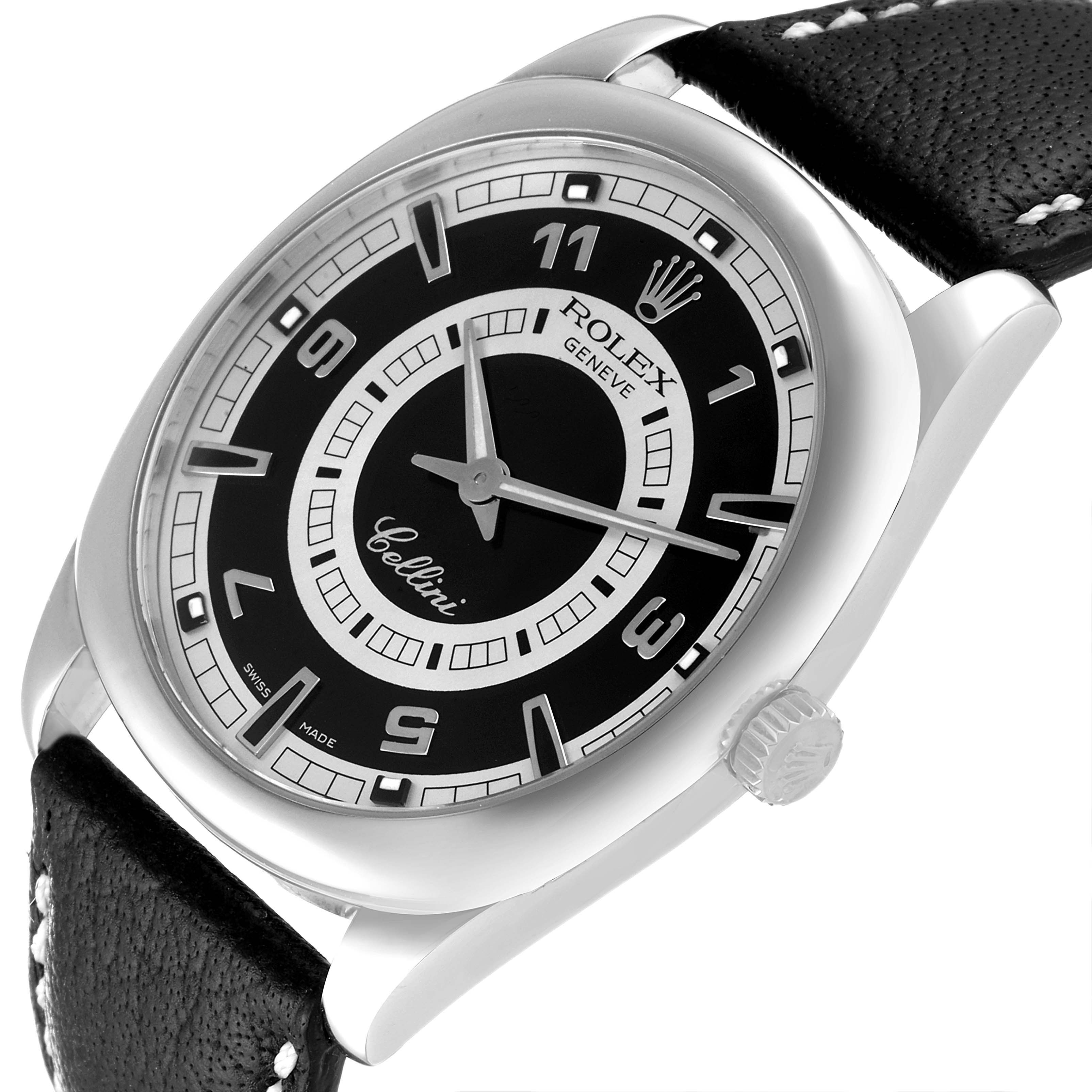 The image shows a top-side angle of the Rolex Cellini 4243 Men
s White Gold Black Dial 4243 Men
s White Gold Black Dial watch, highlighting the black dial, crown, and leather strap.