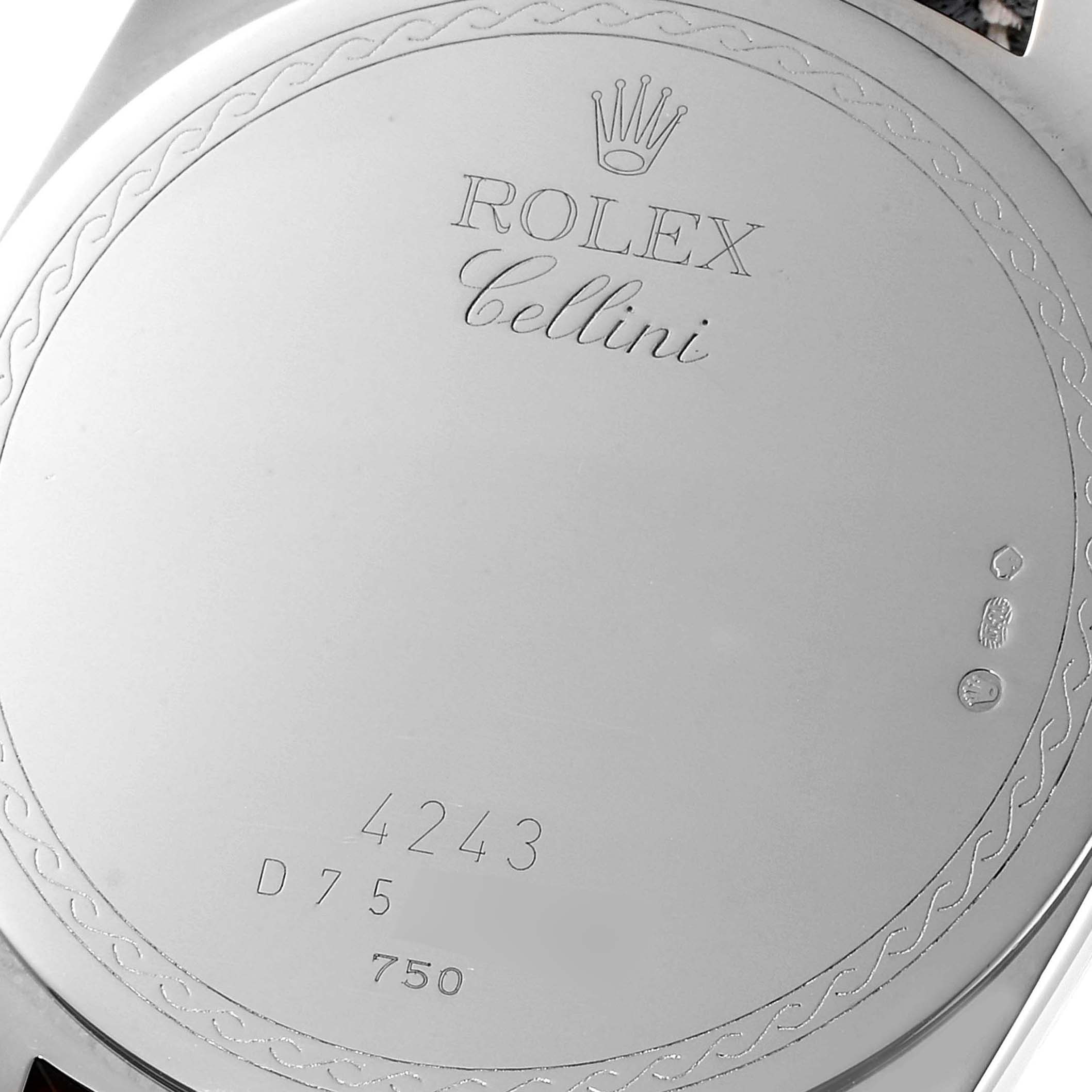 The image shows the back case of a Rolex Cellini 4243 Men
s White Gold Black Dial 4243 Men
s White Gold Black Dial watch, including the brand name, model name, and other engraved details.