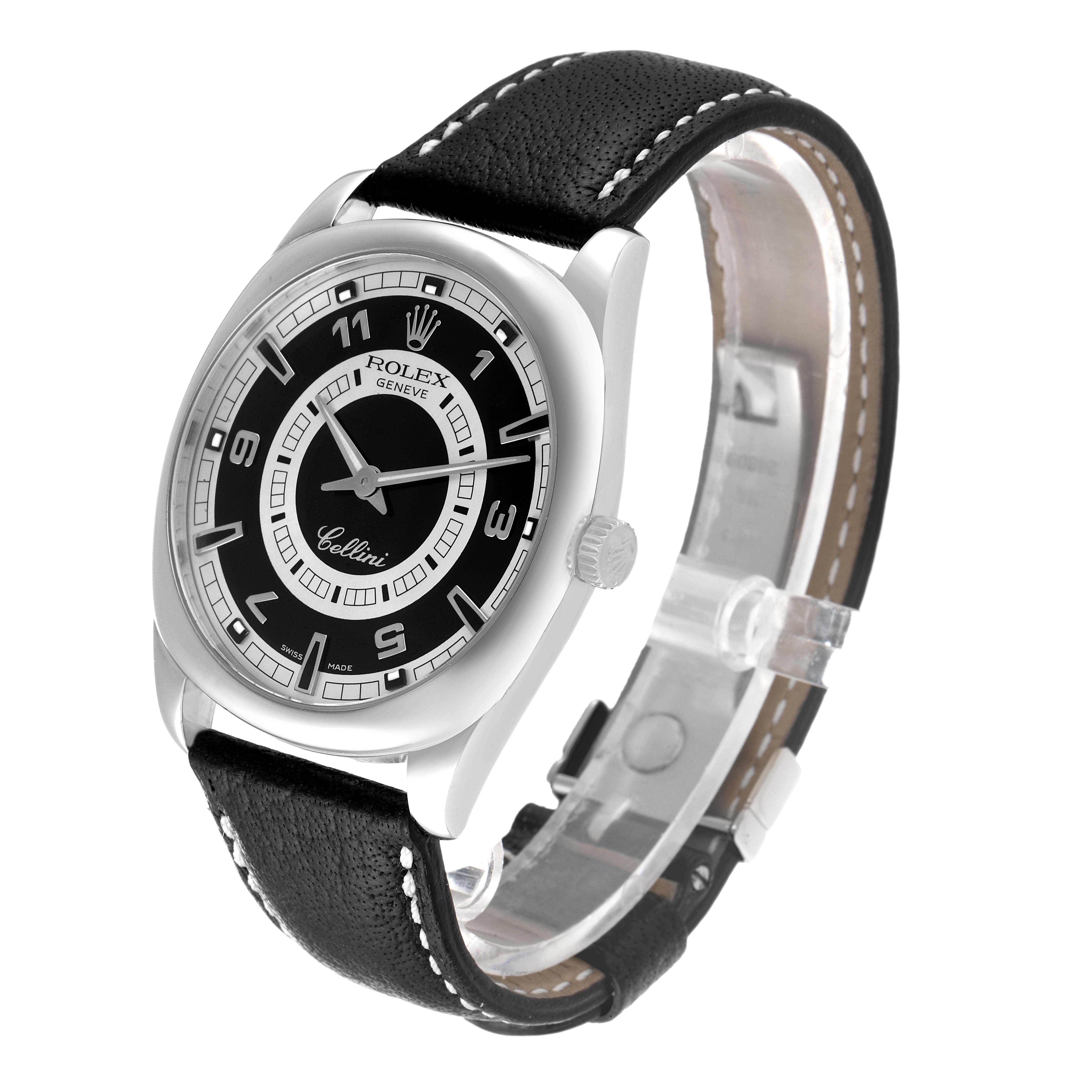 The Rolex Cellini 4243 Men
s White Gold Black Dial 4243 Men
s White Gold Black Dial watch is shown at a three-quarter angle, displaying the face, crown, and leather strap.