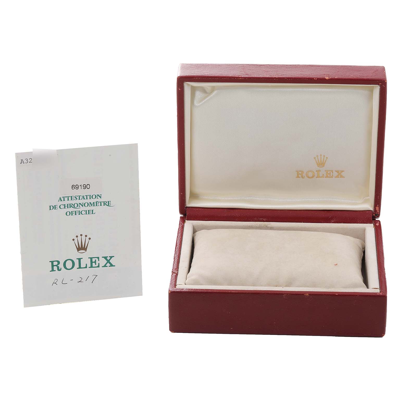 This image shows an open Rolex Datejust 69190 Women's Stainless Steel Silver Dial 69190 Women's Stainless Steel Silver Dial watch box and its certificate positioned next to it.