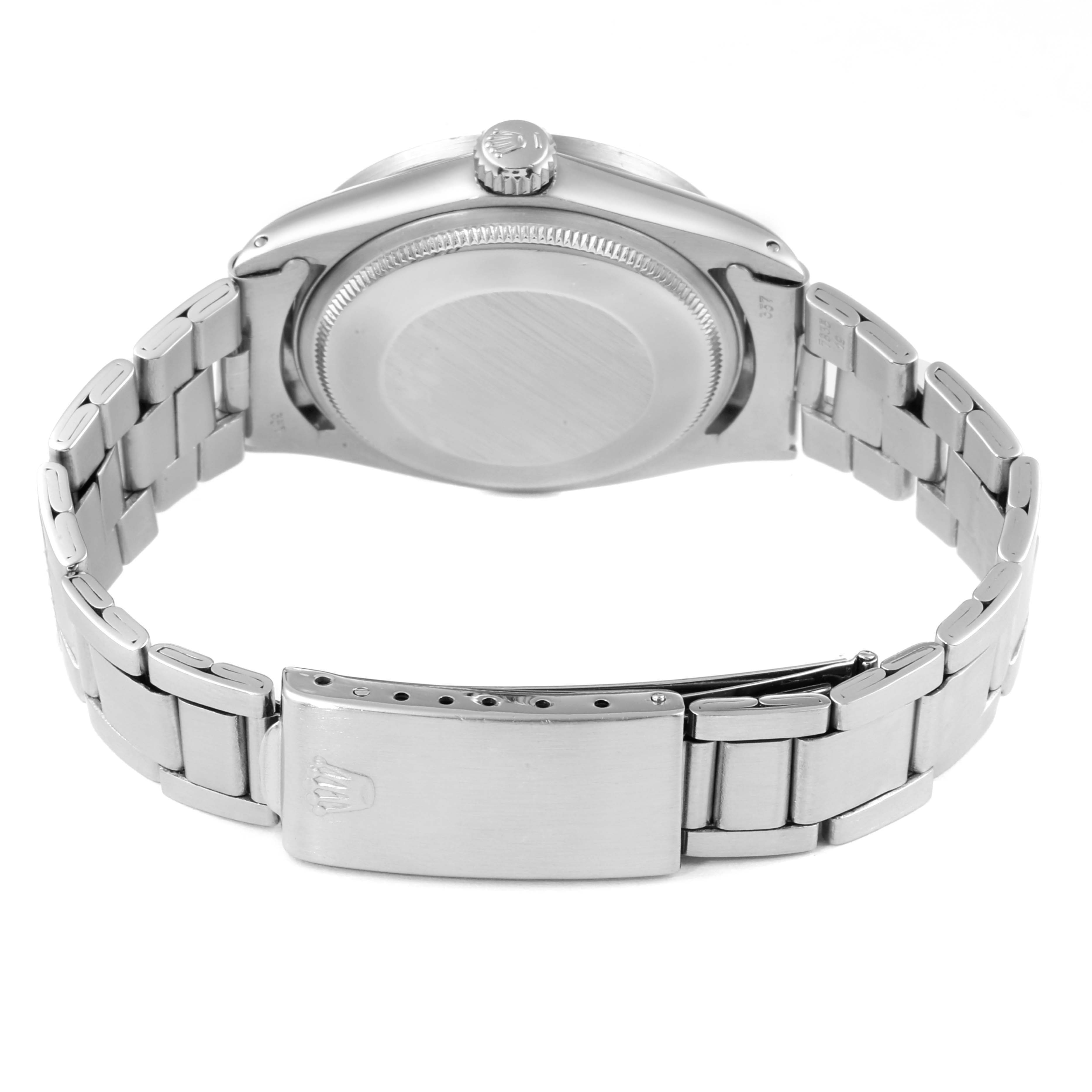 This image shows the back case, crown, and bracelet clasp of the Rolex Vintage Collection 1501 Men's Stainless Steel Silver Dial 1501 Men's Stainless Steel Silver Dial model watch.