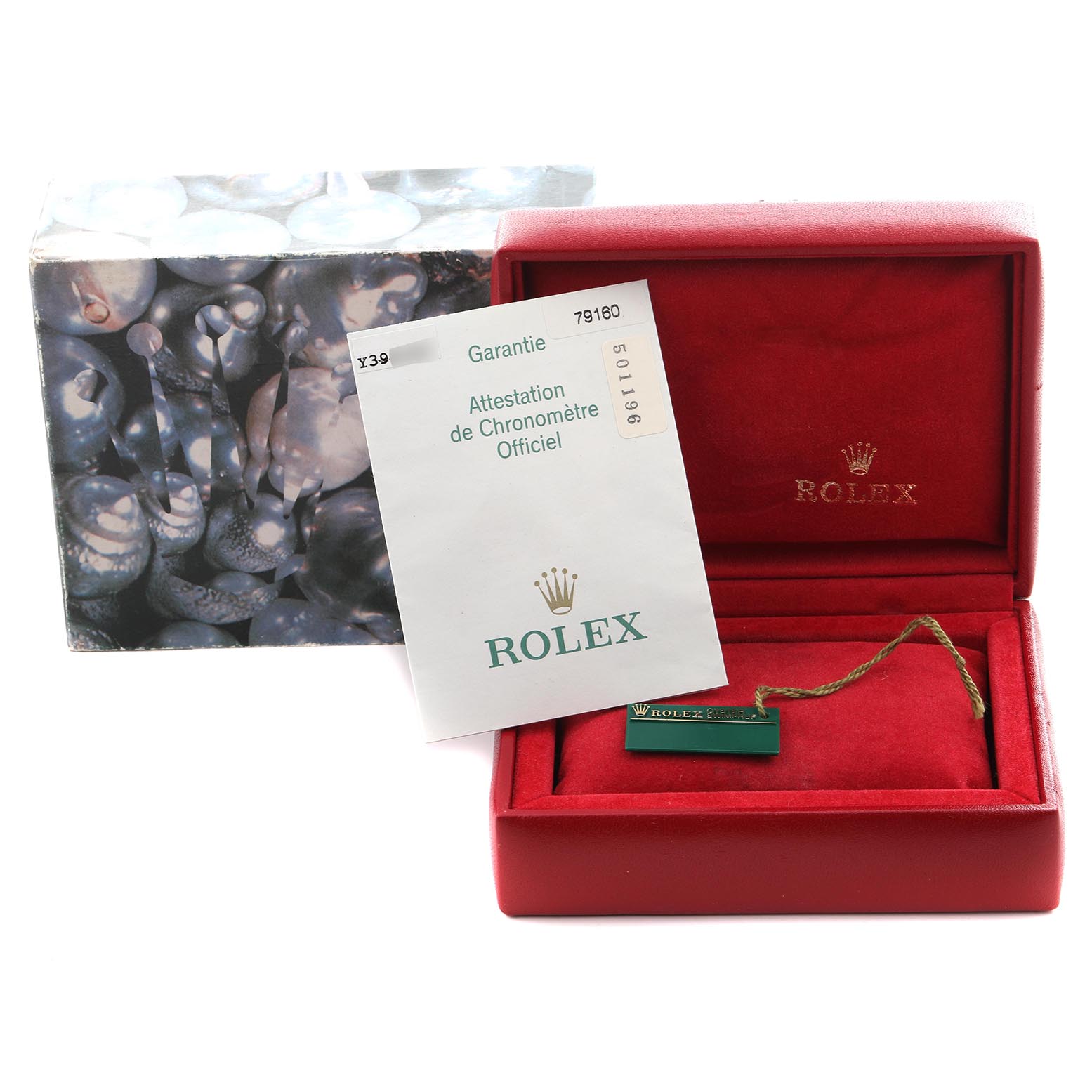 The image shows a Rolex Date 79160 Women's Stainless Steel White Dial 79160 Women's Stainless Steel White Dial model box with documentation and a green tag inside the open box.