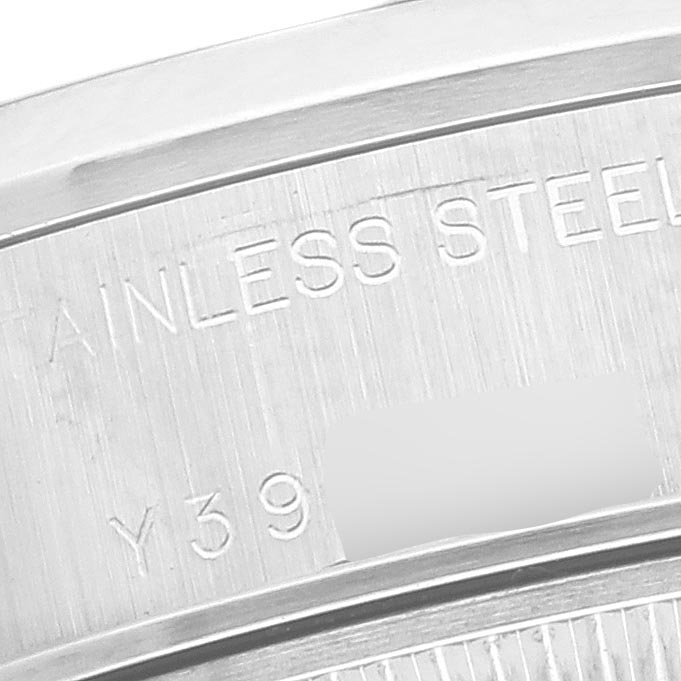The image shows a close-up of the case side, highlighting the Rolex Date 79160 Women's Stainless Steel White Dial 79160 Women's Stainless Steel White Dial model's engraved markings.