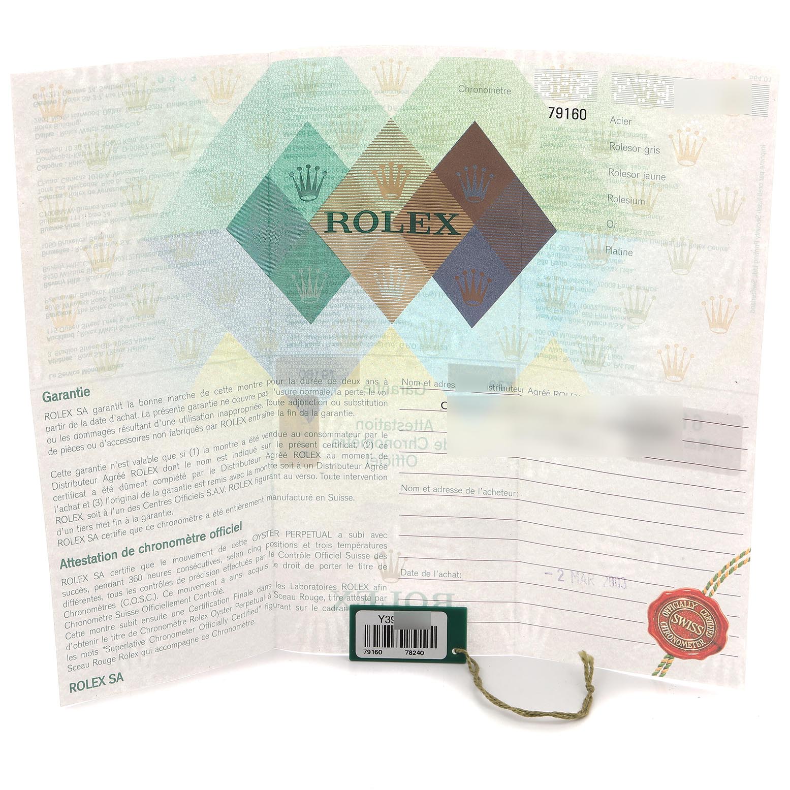 The image shows the guarantee and certificate papers for a Rolex Date 79160 Women's Stainless Steel White Dial 79160 Women's Stainless Steel White Dial model, featuring text and a green tag with a string.