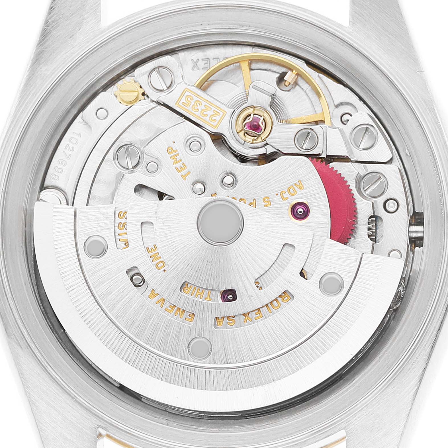 The image shows the movement of a Rolex Datejust 79173 Women's Steel and Gold (two tone) White Dial watch from a back angle, highlighting intricate components and engravings.