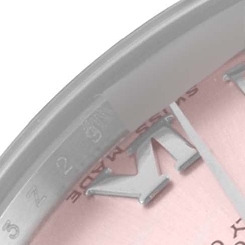 The image shows a close-up of a Rolex Mid-Size 178344 Women's Stainless Steel Pink Dial 178344 Women's Stainless Steel Pink Dial watch face, focusing on a section of the hour markers and dial details.