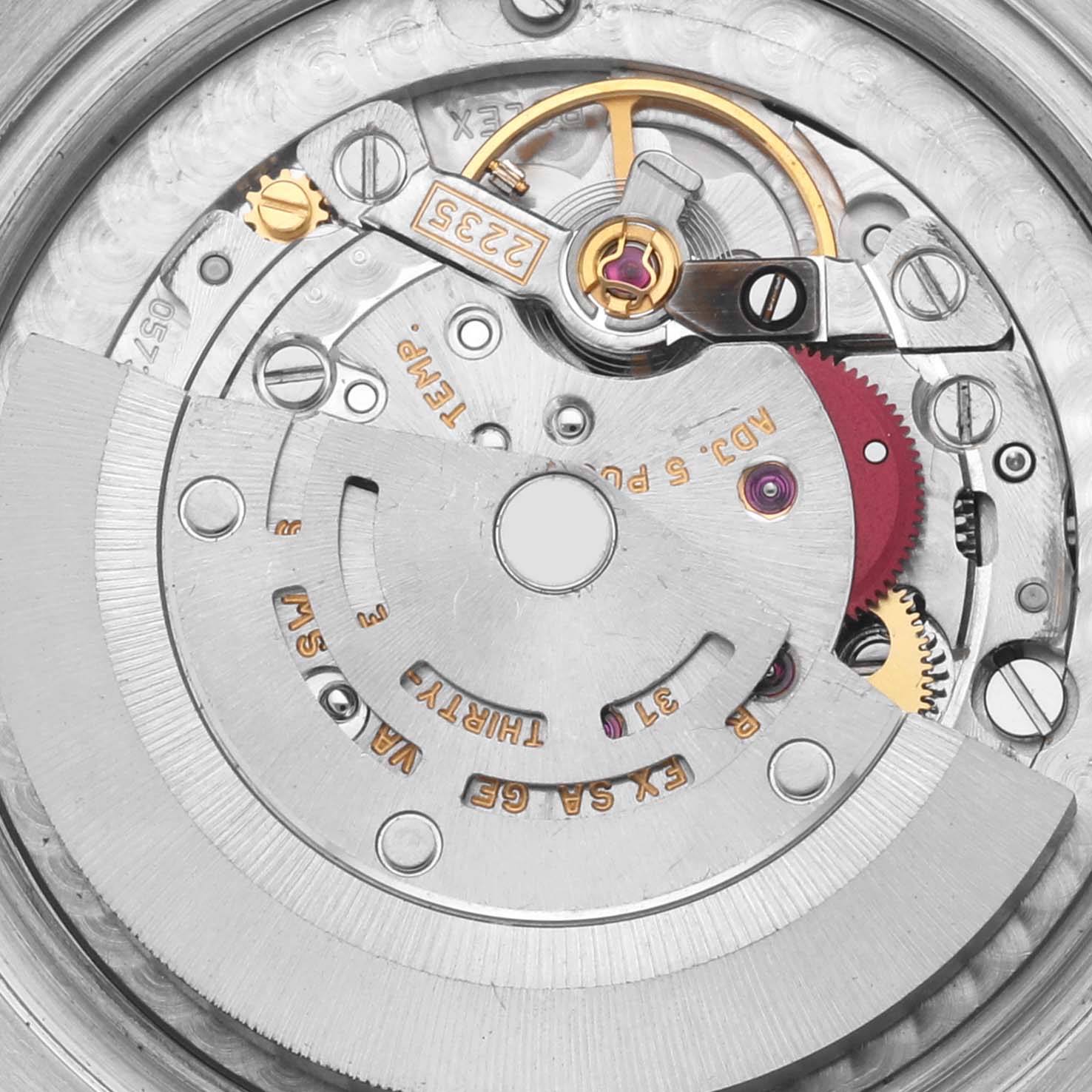 The image shows the movement mechanism from a Rolex Mid-Size 178344 Women's Stainless Steel Pink Dial 178344 Women's Stainless Steel Pink Dial model, highlighting gears, balance wheel, and rotor details.