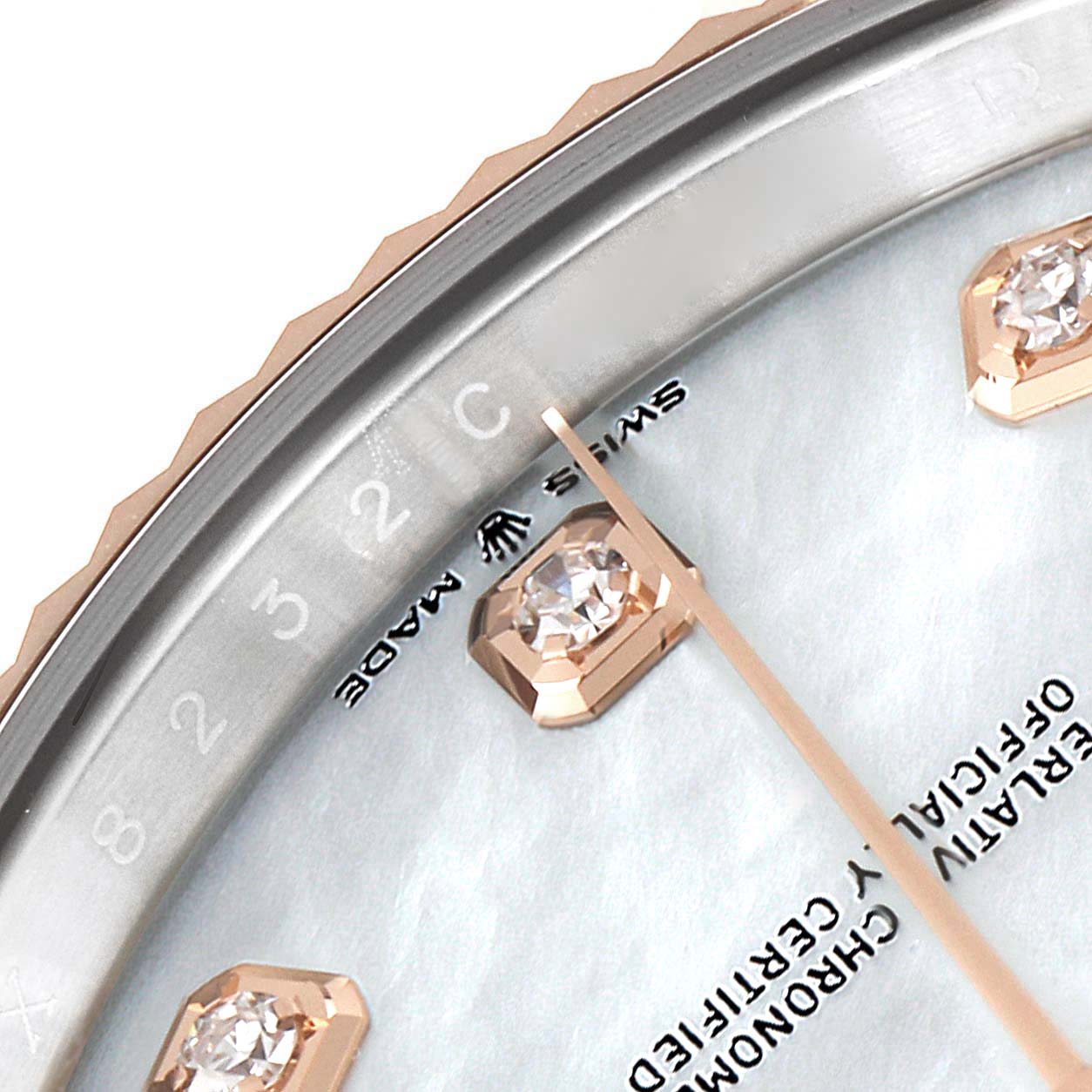 The image shows a close-up of the dial, bezel, and diamond hour markers of a Rolex Datejust 41 126331 Men's Steel and Gold (two tone) Mother of Pearl Dial 126331 Men's Steel and Gold (two tone) Mother of Pearl Dial watch.