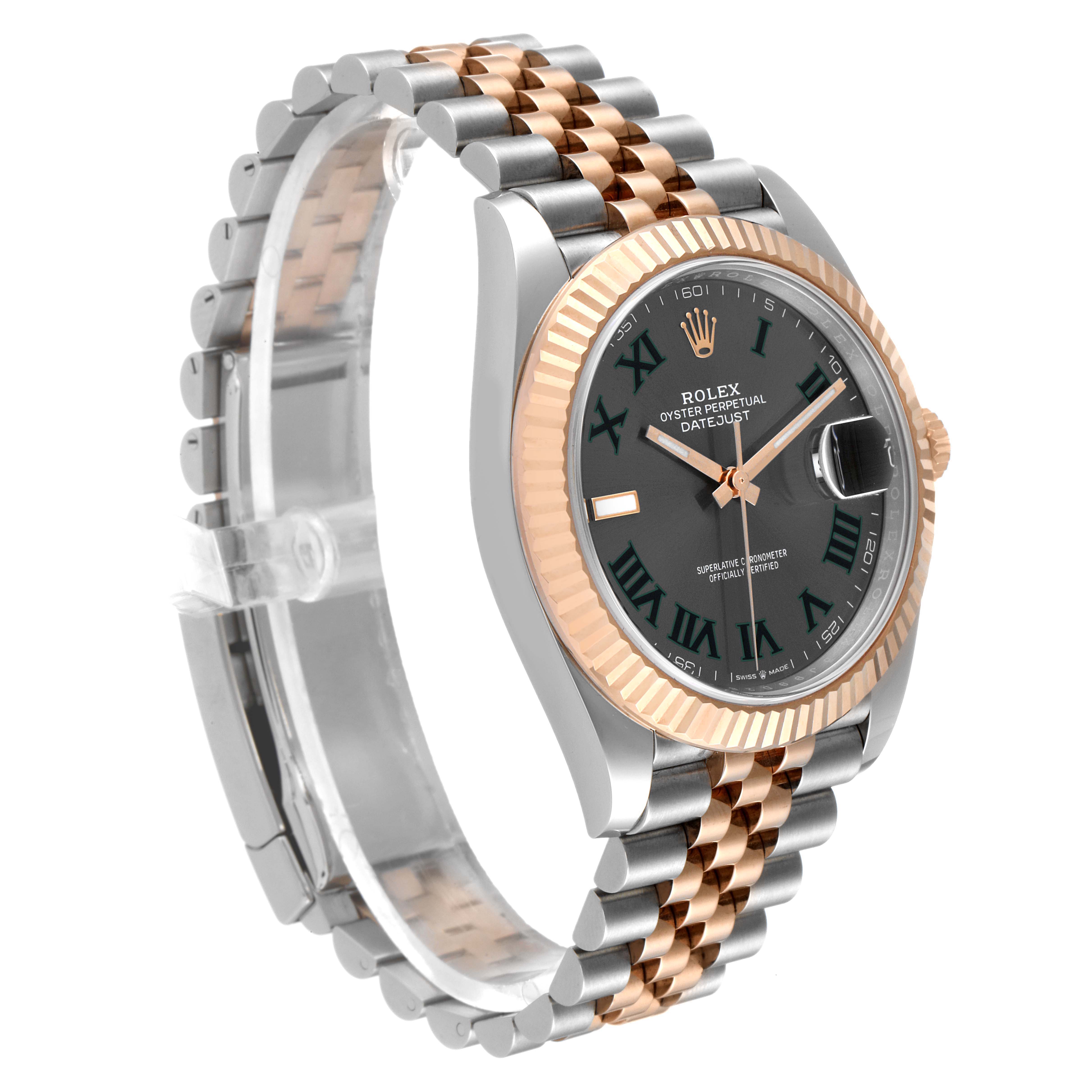 The Rolex Datejust 41 126331 Men's Steel and Gold (two tone) Grey Dial 126331 Men's Steel and Gold (two tone) Grey Dial is shown at a slight angle, highlighting its two-tone bracelet, fluted bezel, and black dial with Roman numerals.