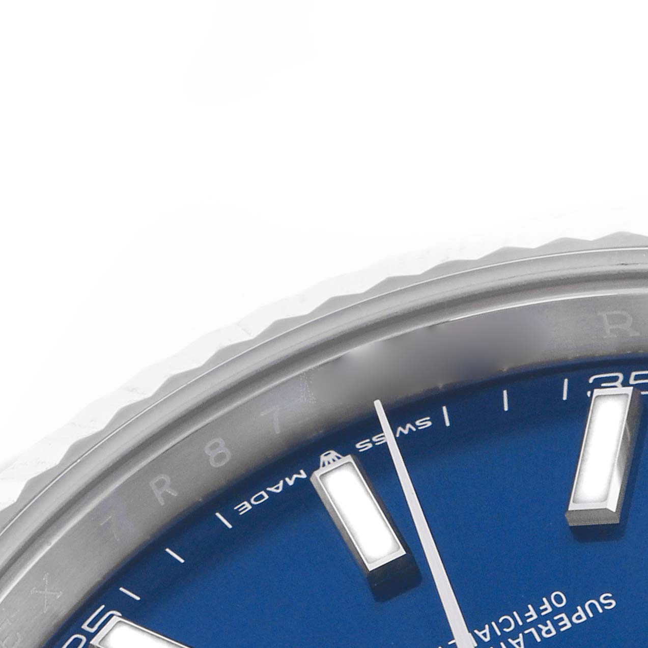 The image shows a partial close-up of the dial and bezel of a Rolex Datejust 41 126334 Men's Stainless Steel Blue Dial 126334 Men's Stainless Steel Blue Dial, focusing on the indices and chapter ring.