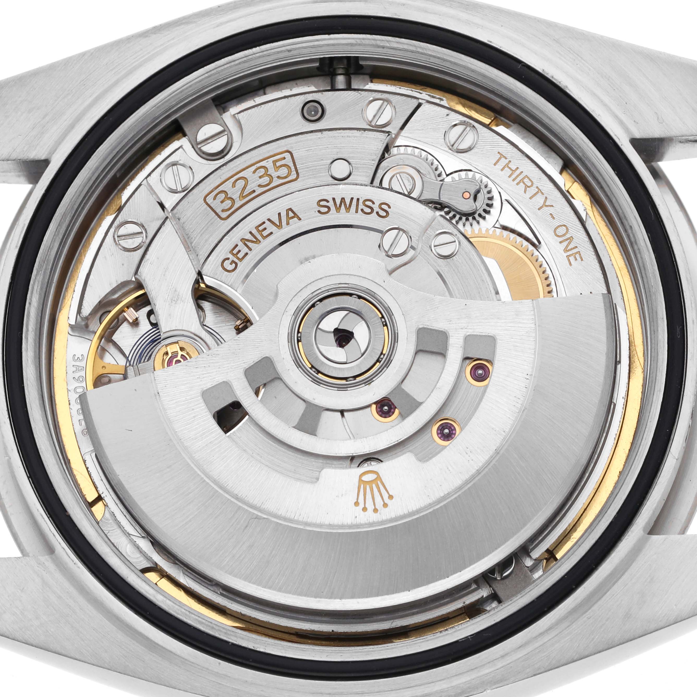 The image of the Rolex Datejust 41 126334 Men's Stainless Steel Blue Dial 126334 Men's Stainless Steel Blue Dial shows the watch's movement from the back, highlighting the rotor and inner mechanism.