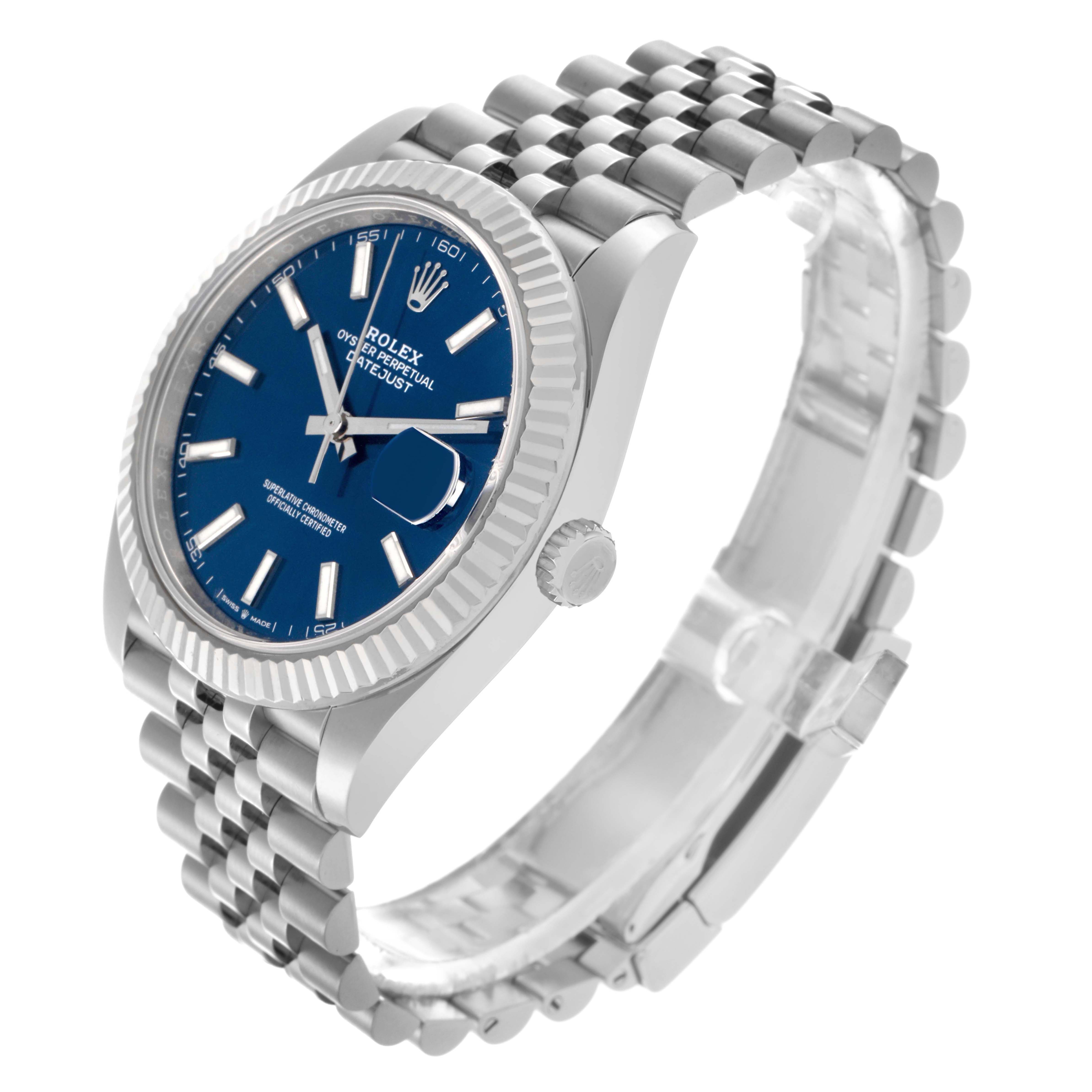 The Rolex Datejust 41 126334 Men's Stainless Steel Blue Dial 126334 Men's Stainless Steel Blue Dial is shown at a three-quarter angle, highlighting the blue dial, fluted bezel, bracelet, and crown.