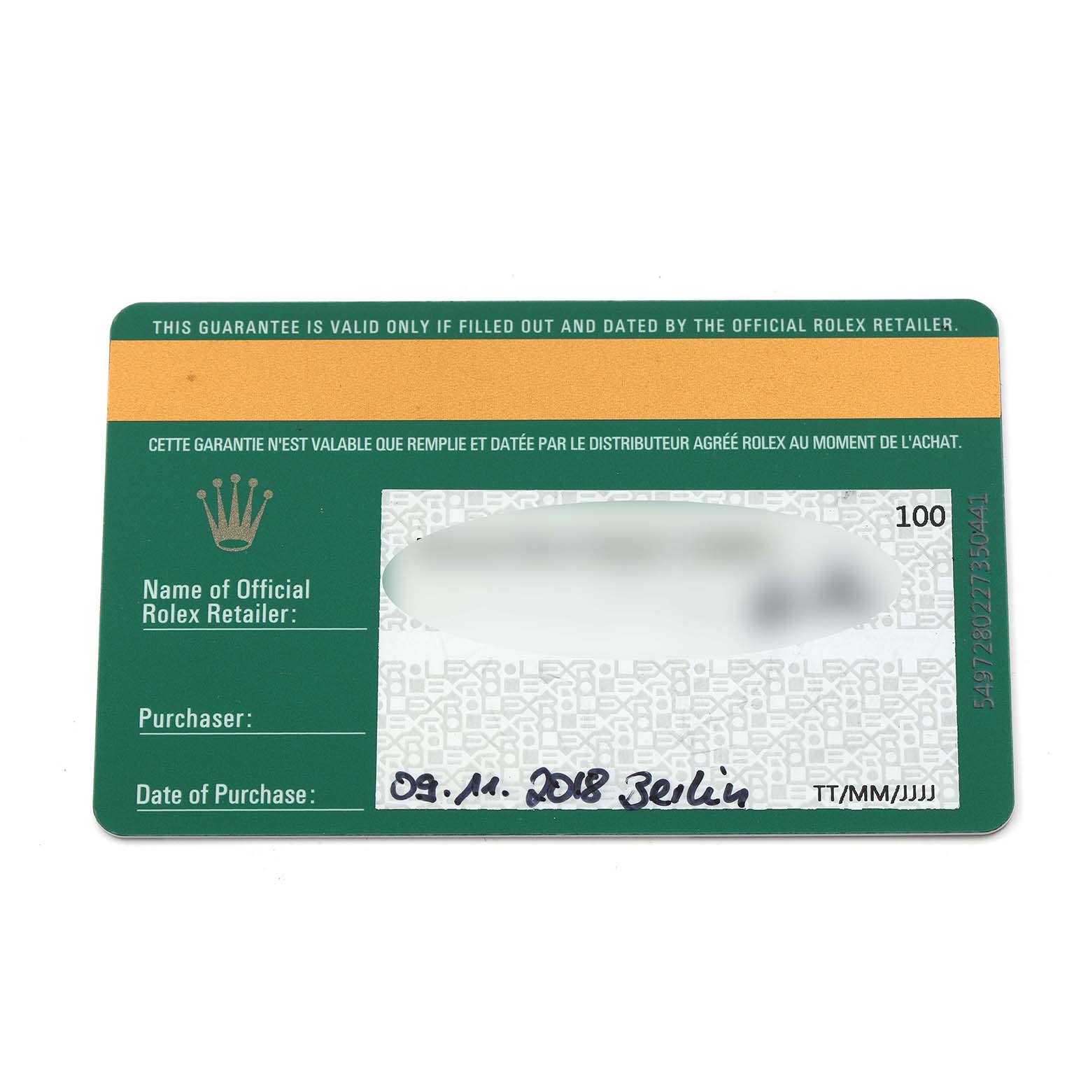 The image shows a close-up of a Rolex Datejust 41 126334 Men's Stainless Steel Blue Dial 126334 Men's Stainless Steel Blue Dial model warranty card with purchase details.