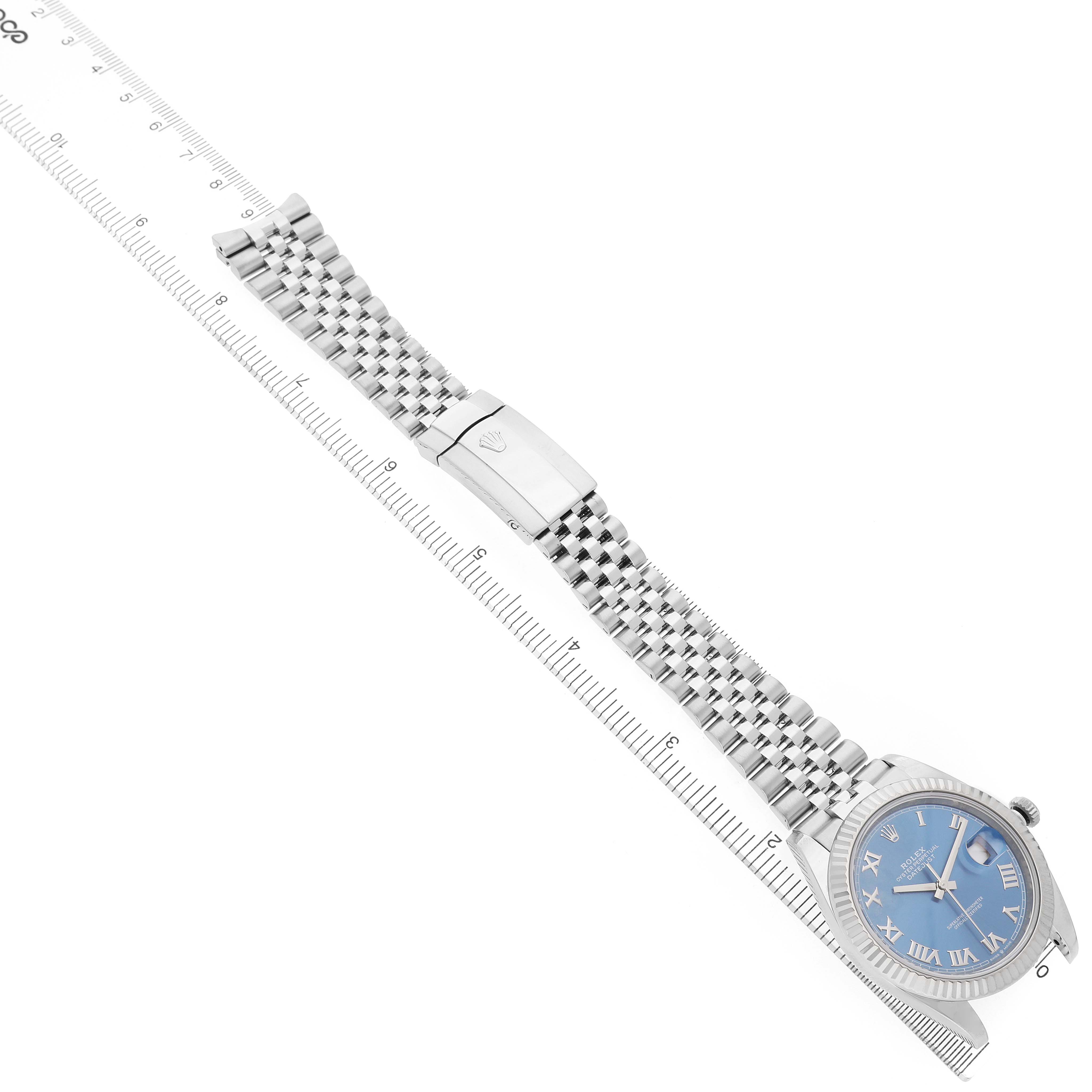 The image shows a Rolex Datejust 41 126334 Men's Stainless Steel Blue Dial watch from a top-down angle, highlighting its blue dial, case, and Jubilee bracelet with clasp.