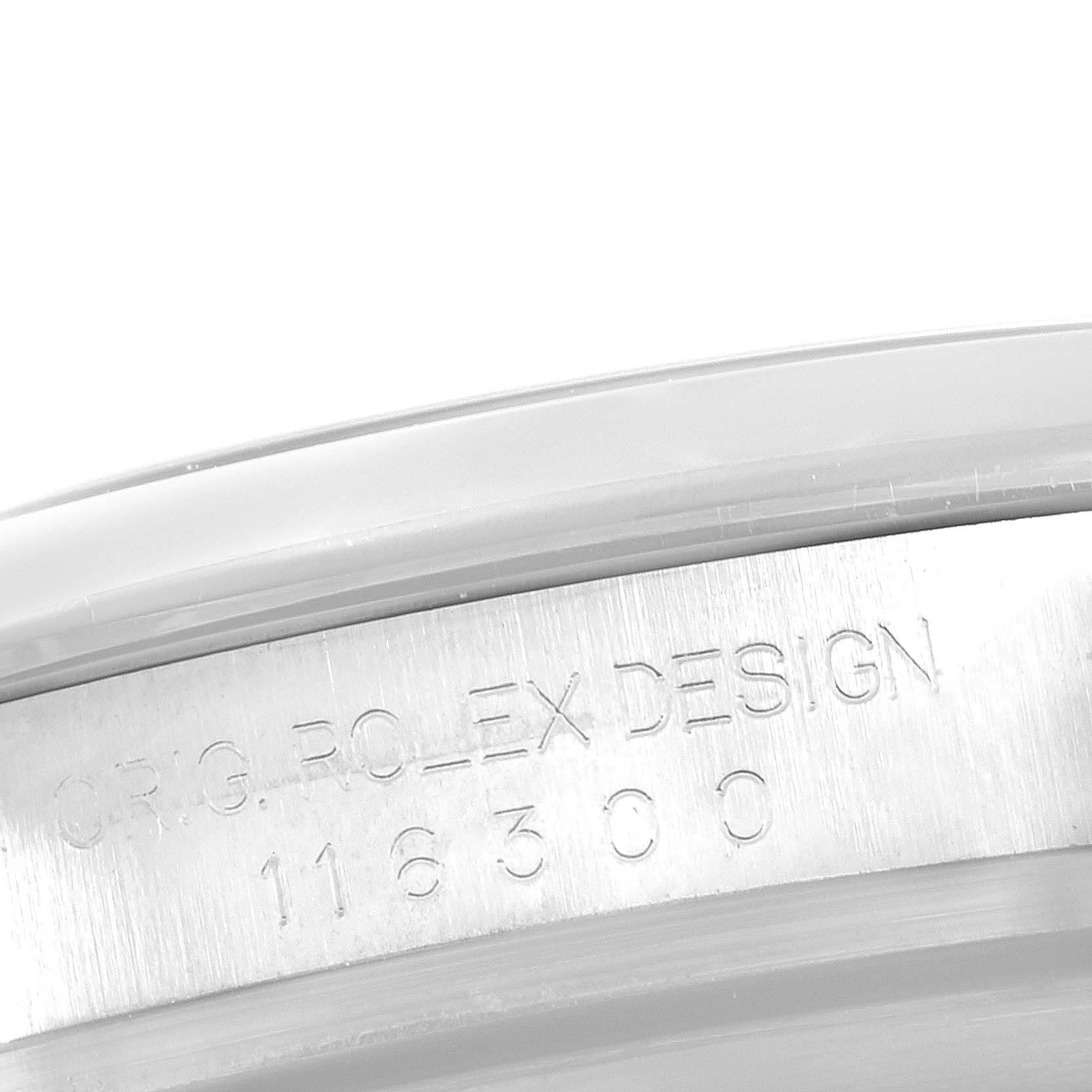 The image shows the engraved inner bezel of a Rolex Datejust 41 116300 Men
s Stainless Steel Blue Dial 116300 Men
s Stainless Steel Blue Dial model.