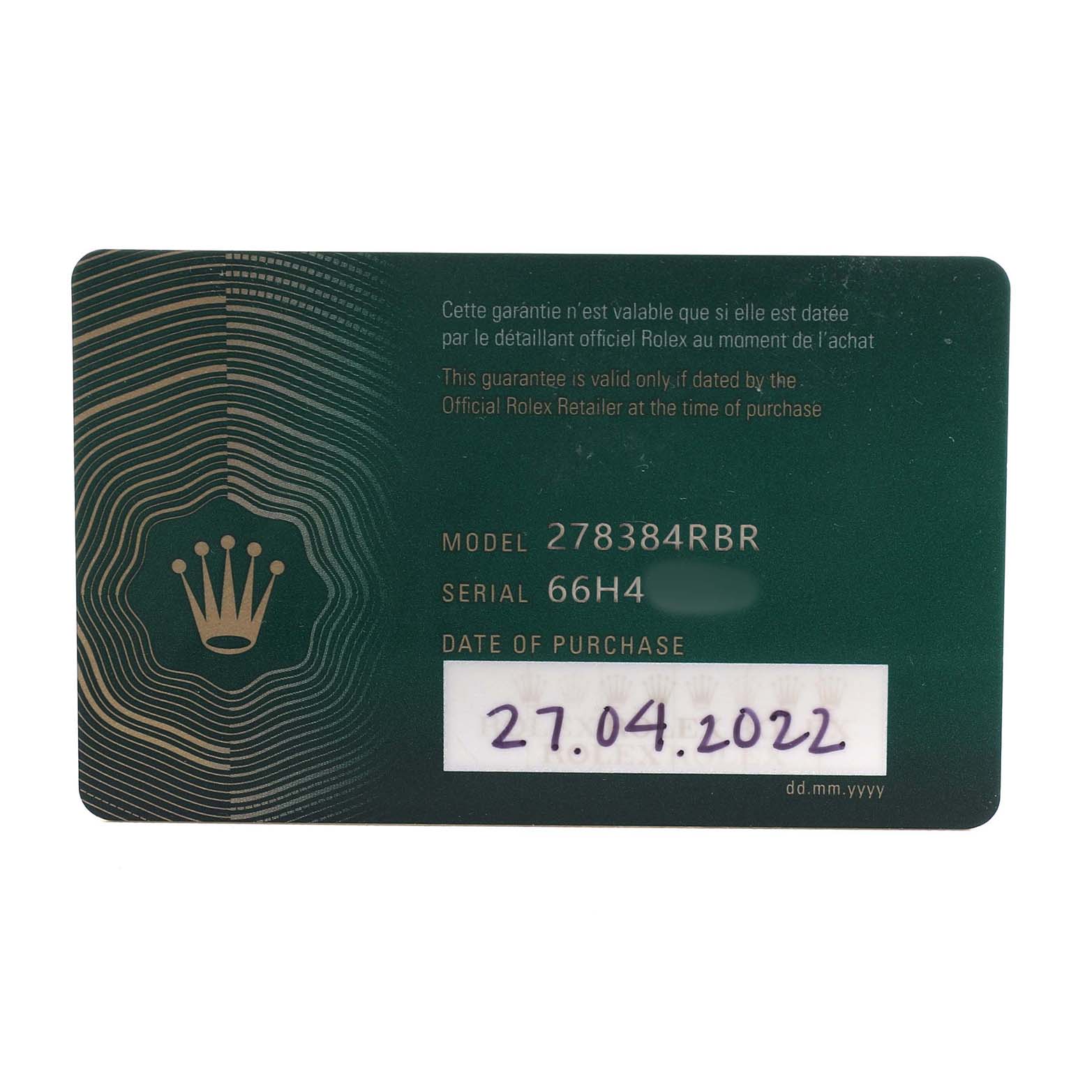 This image shows a Rolex warranty card for the Datejust model, displaying model, serial number, and purchase date.