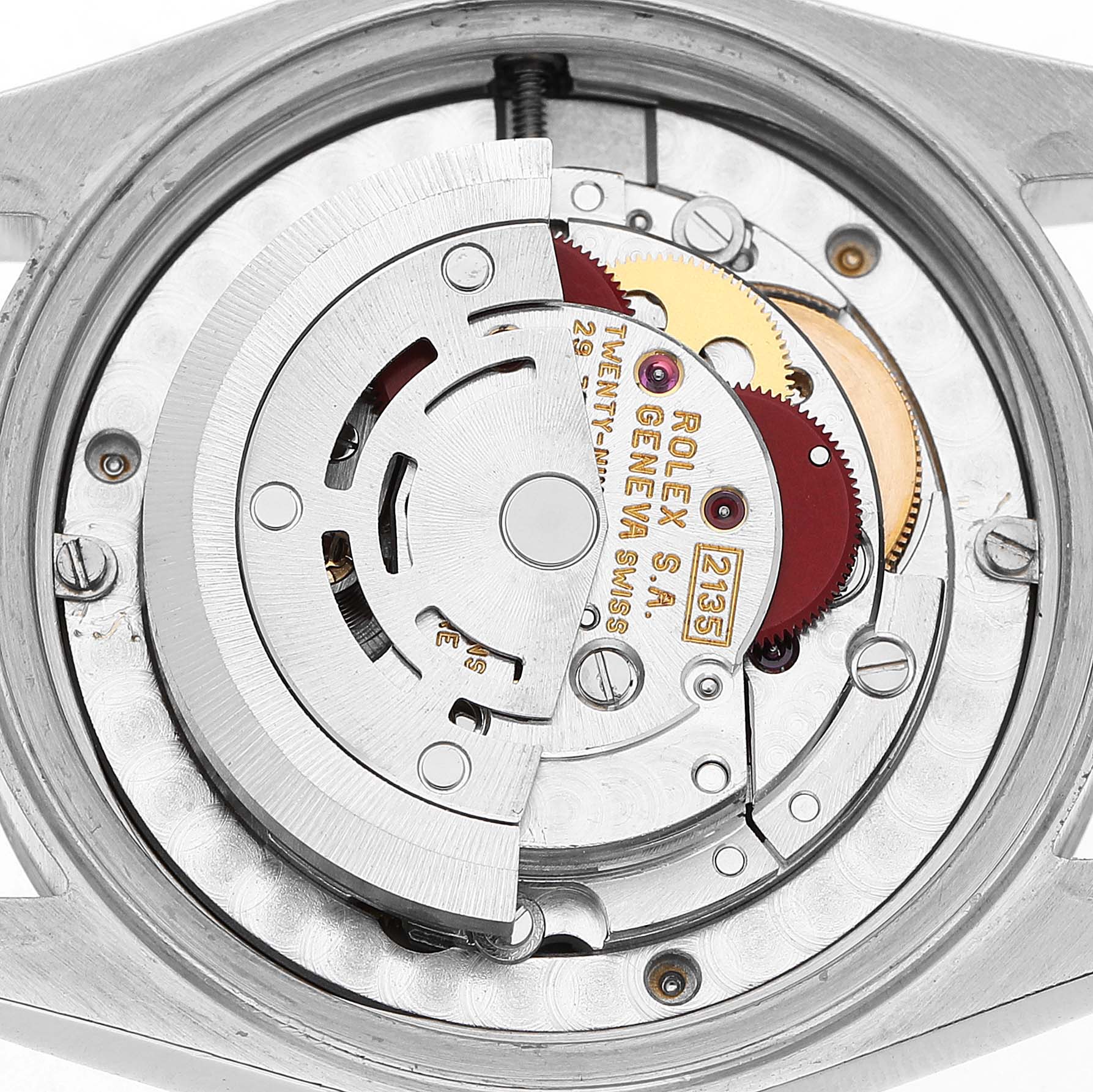 The image shows the internal movement mechanism of a Rolex Datejust 68274 Men's Stainless Steel Orange Dial watch from a top-down angle.