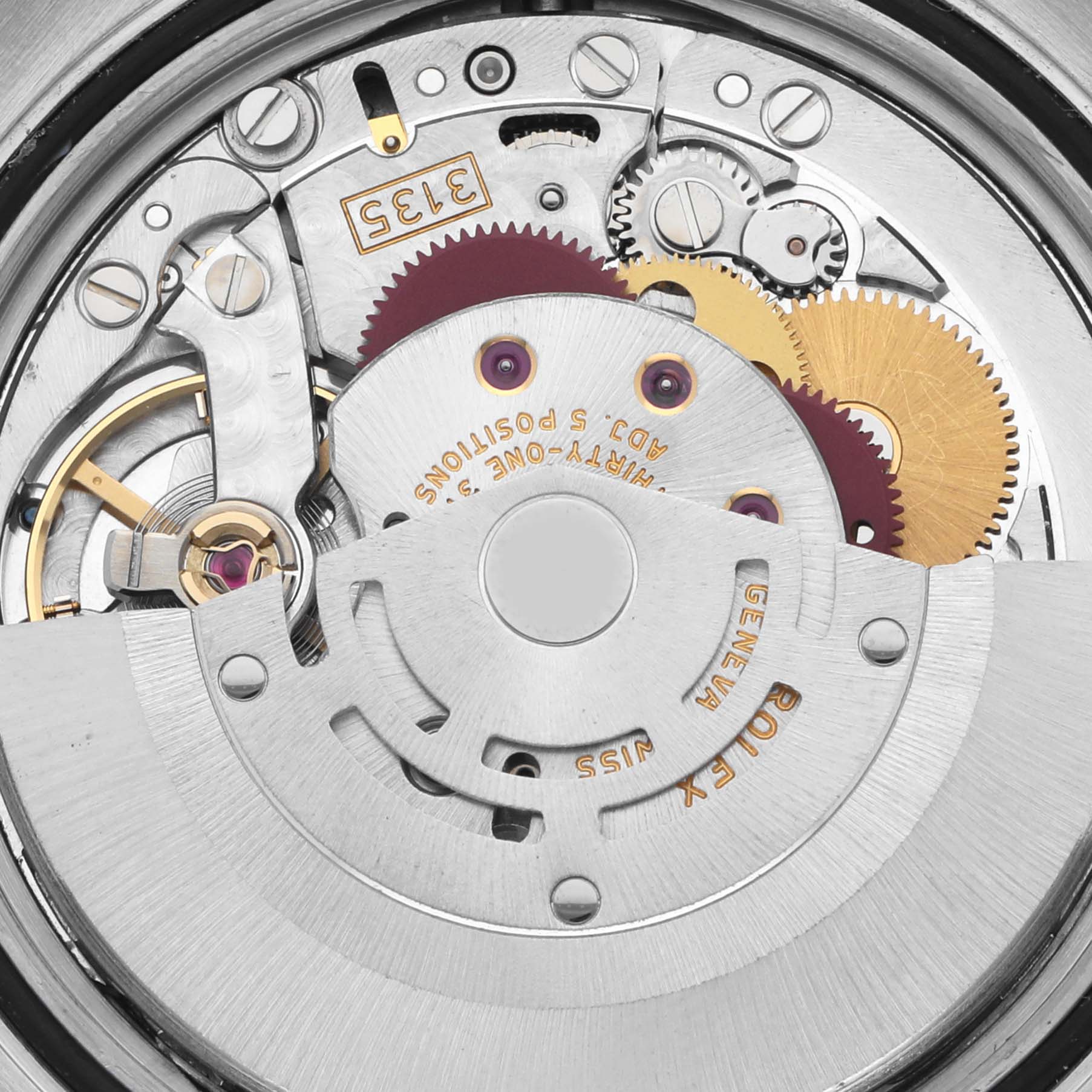 The image shows an up-close view of the Rolex Datejust 116231 Men's Steel and Gold (two tone) Pink Dial 116231 Men's Steel and Gold (two tone) Pink Dial's movement, highlighting gears and intricate components from the back.