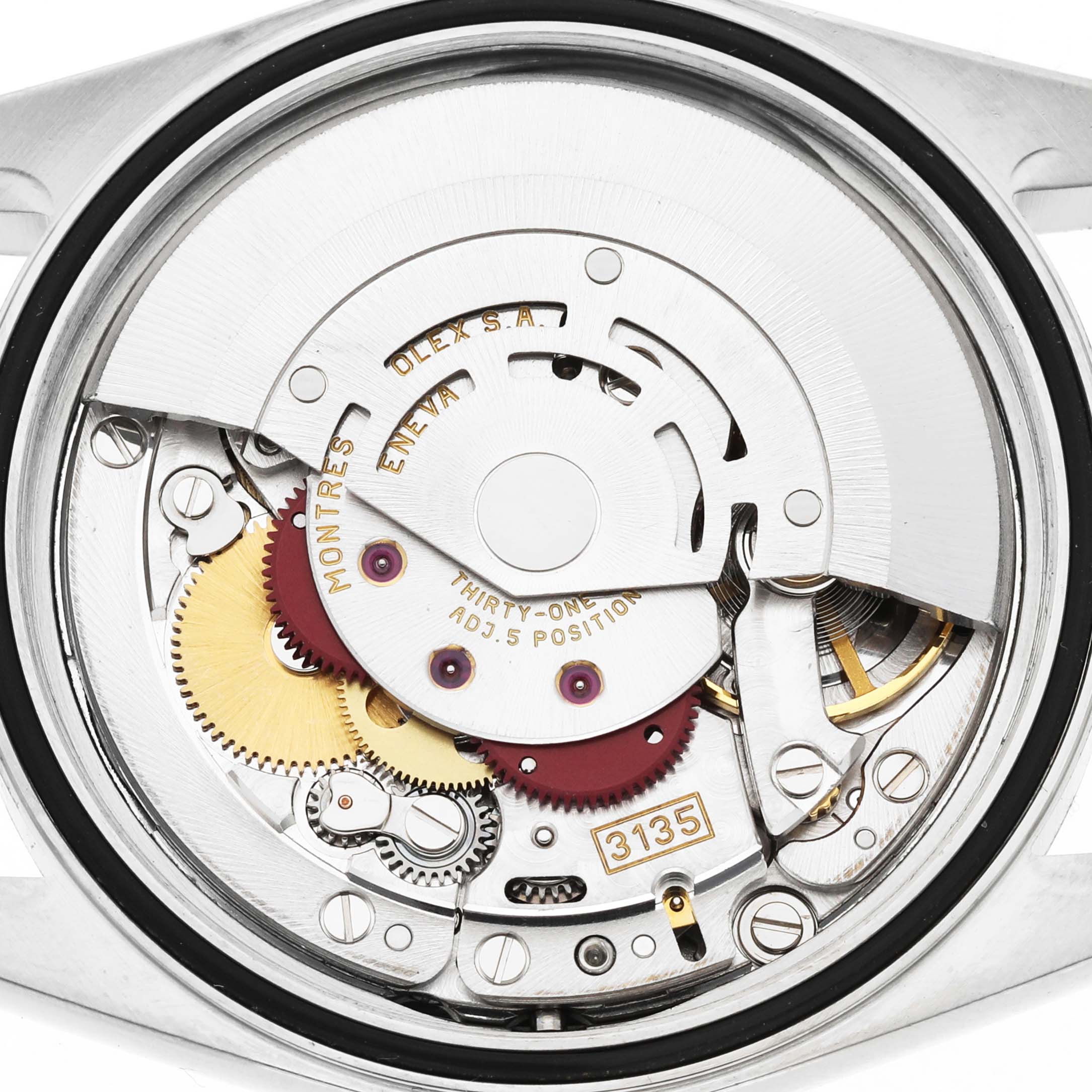 The image shows the open case back view of a Rolex Datejust 16234 Men's White Gold Silver Dial, revealing its intricate movement parts.