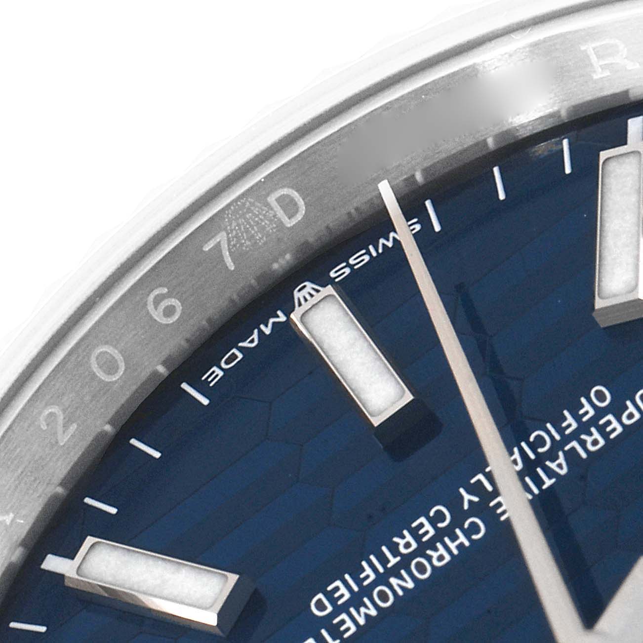 This image shows a close-up of the dial and part of the bezel of a Rolex Datejust 126234 Men
s Stainless Steel Blue Dial 126234 Men
s Stainless Steel Blue Dial watch.