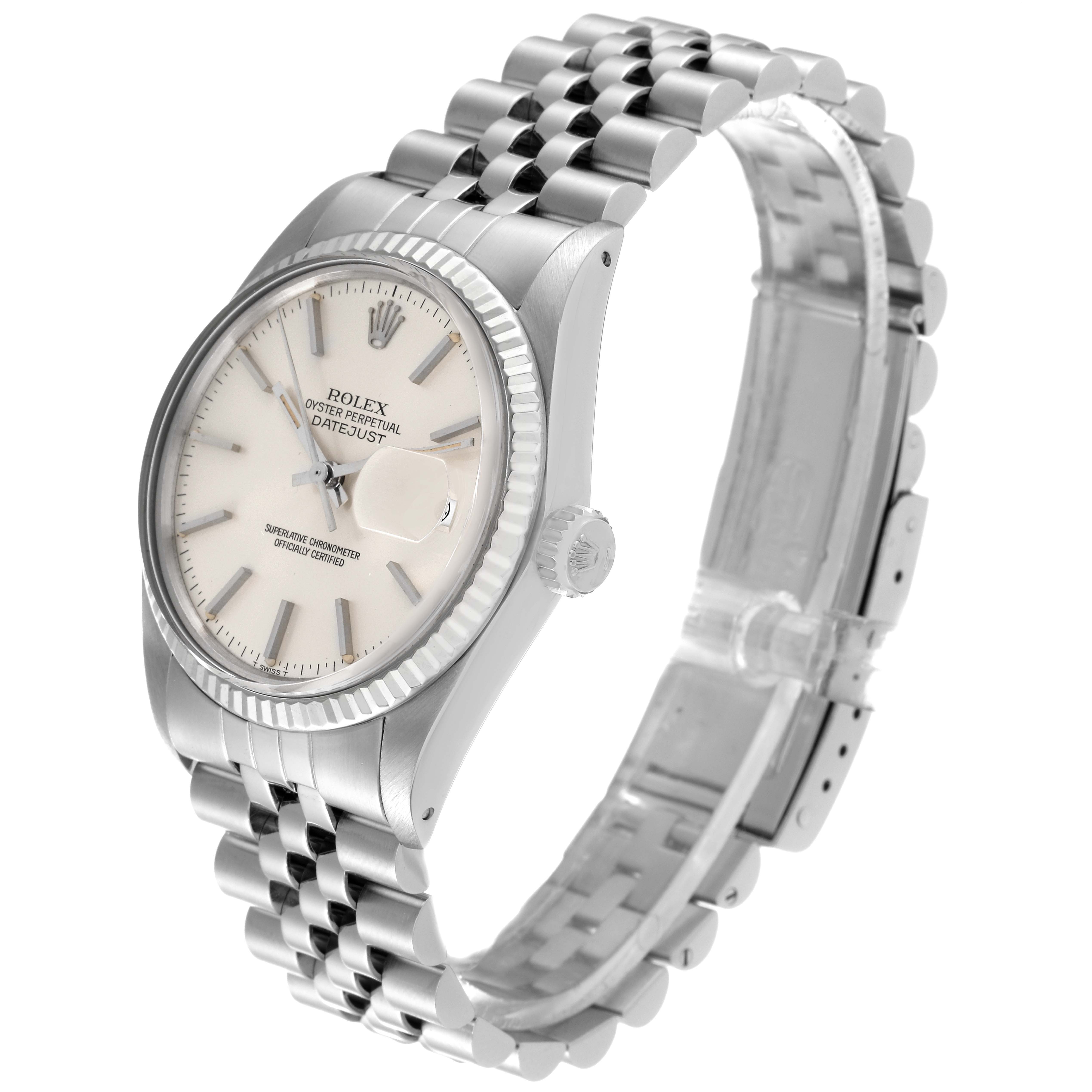 This image shows the Rolex Vintage Collection 16014 Men
s Stainless Steel Silver Dial 16014 Men
s Stainless Steel Silver Dial Datejust watch with a side angle, displaying the watch face, crown, bezel, and bracelet.