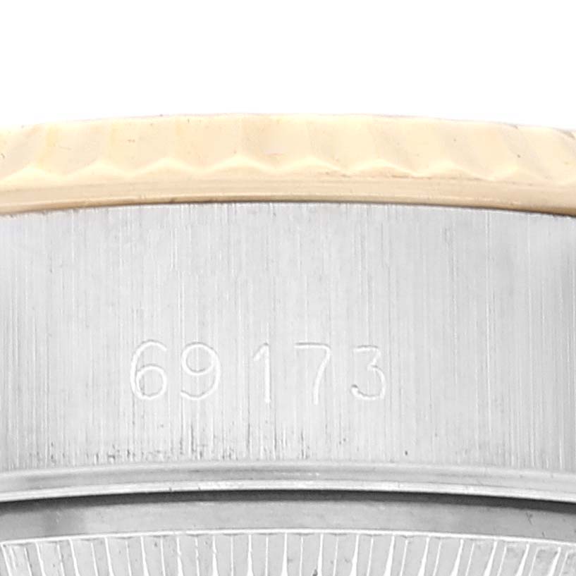This image shows a close-up of the side of a Rolex Datejust 69173 Women's Steel and Gold (two tone) Champagne Dial 69173 Women's Steel and Gold (two tone) Champagne Dial model, focusing on the engraved reference number "69173".