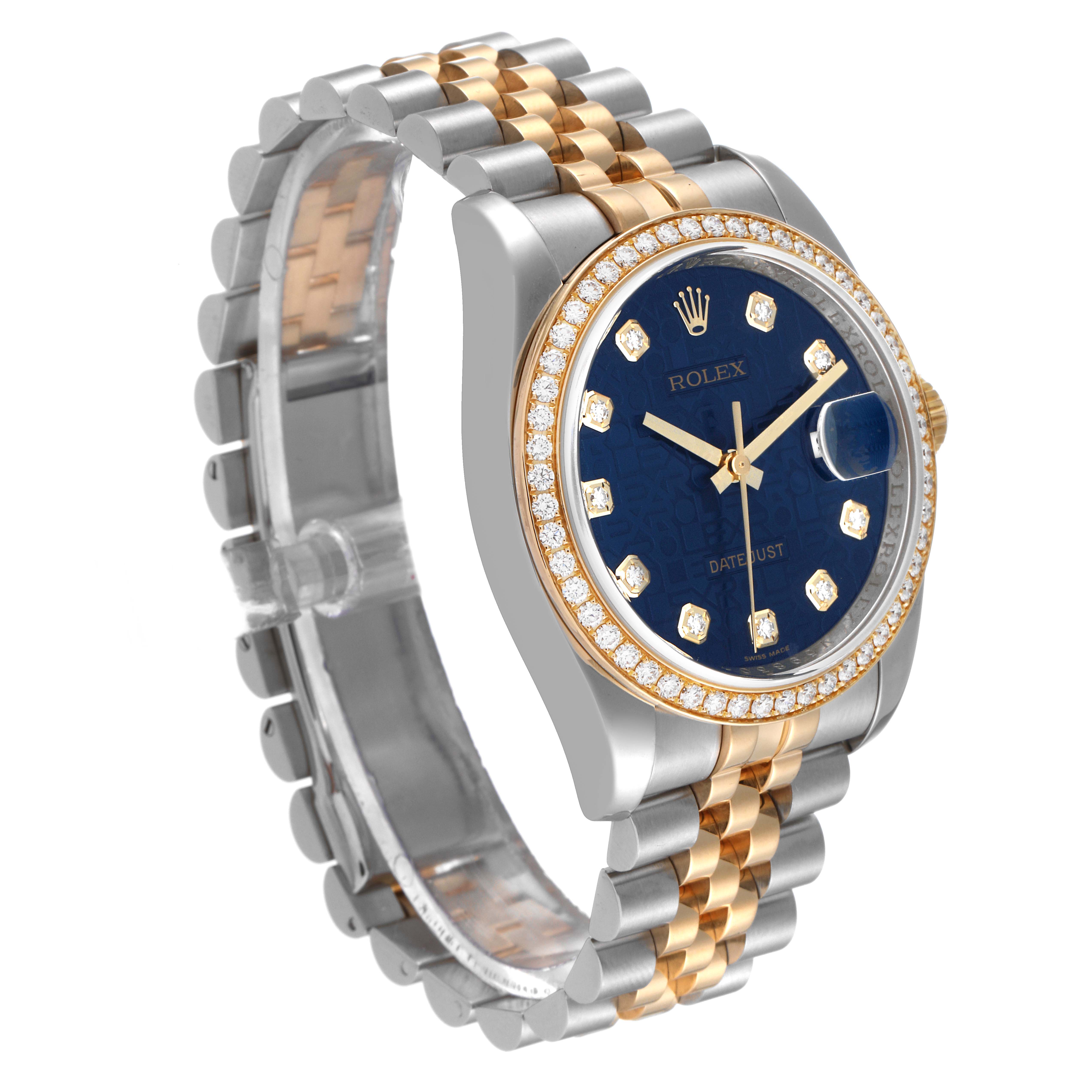 The Rolex Datejust 116243 Men's Steel and Gold (two tone) Blue Dial 116243 Men's Steel and Gold (two tone) Blue Dial watch is shown from a slightly angled side view, displaying its two-tone bracelet, blue dial, and diamond bezel.