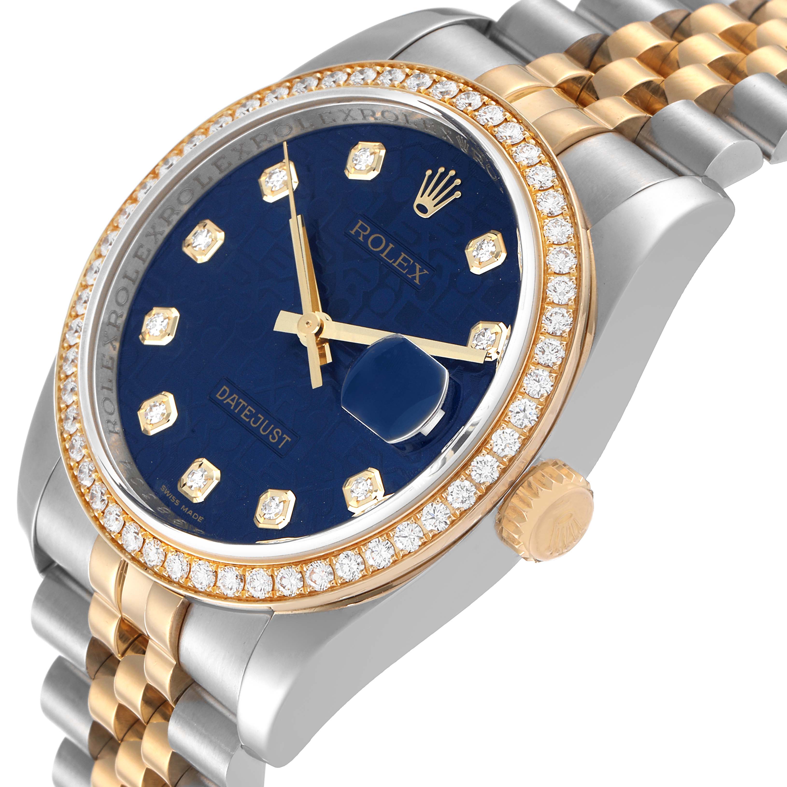 The Rolex Datejust 116243 Men's Steel and Gold (two tone) Blue Dial 116243 Men's Steel and Gold (two tone) Blue Dial watch is viewed from an angled close-up, showing its blue dial, diamond bezel, and two-tone bracelet.