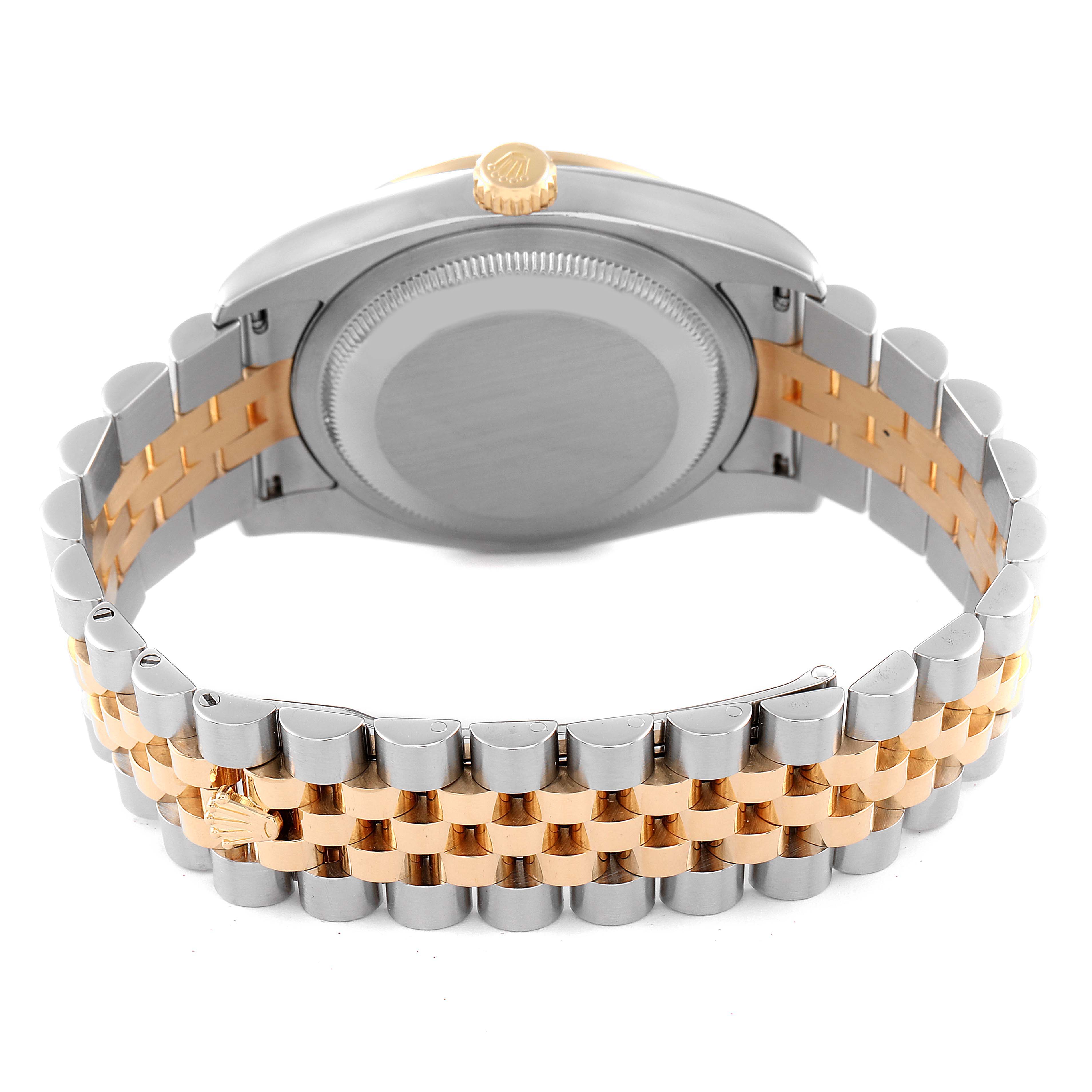 The image shows the back of the Rolex Datejust 116243 Men's Steel and Gold (two tone) Blue Dial 116243 Men's Steel and Gold (two tone) Blue Dial watch, focusing on the case back and the stainless steel and gold bracelet.