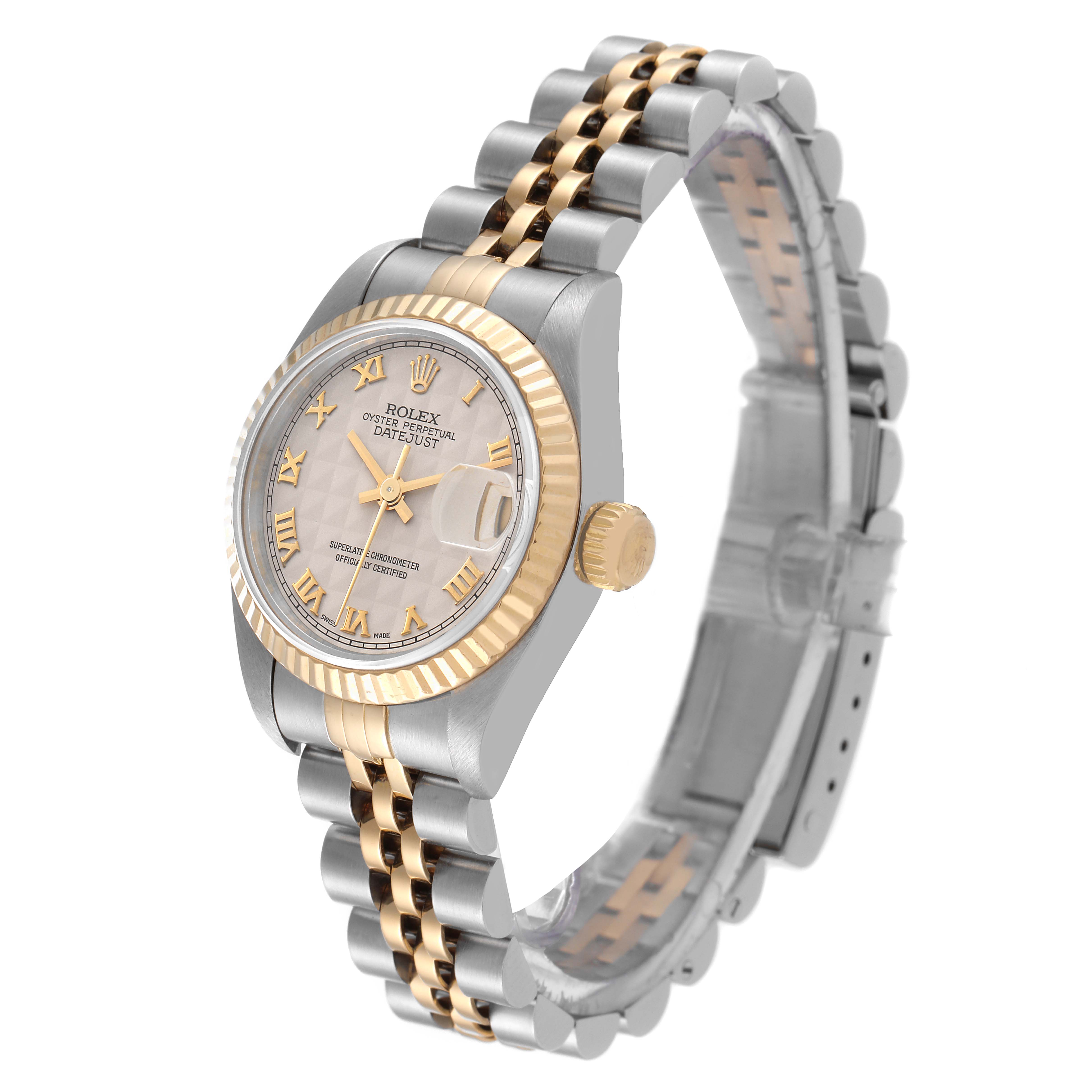 The Rolex Datejust 69173 Women's Steel and Gold (two tone) Beige Dial 69173 Women's Steel and Gold (two tone) Beige Dial watch is shown from a front-side angle, displaying its two-tone bracelet, fluted bezel, and Roman numeral dial.