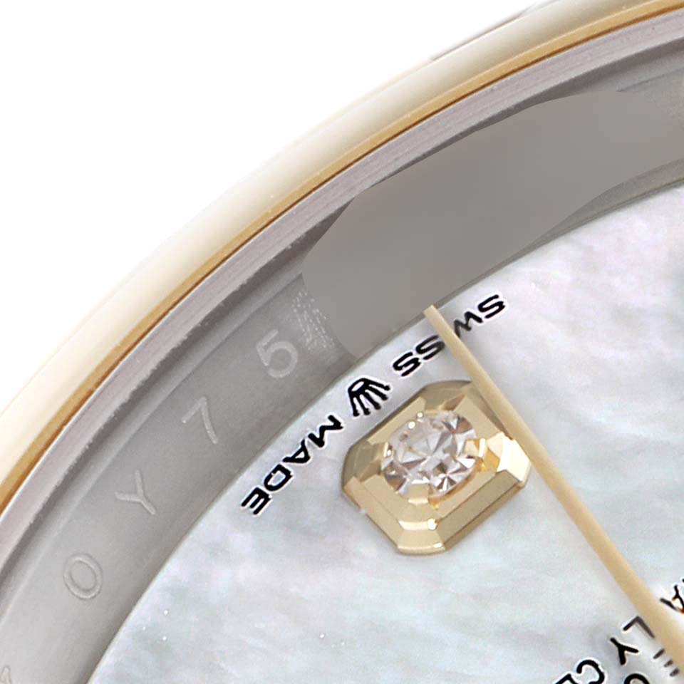 The image shows a close-up view of the bezel, dial, and diamond marker of a Rolex Datejust 126203 Men's Steel and Gold (two tone) Mother of Pearl Dial 126203 Men's Steel and Gold (two tone) Mother of Pearl Dial watch.