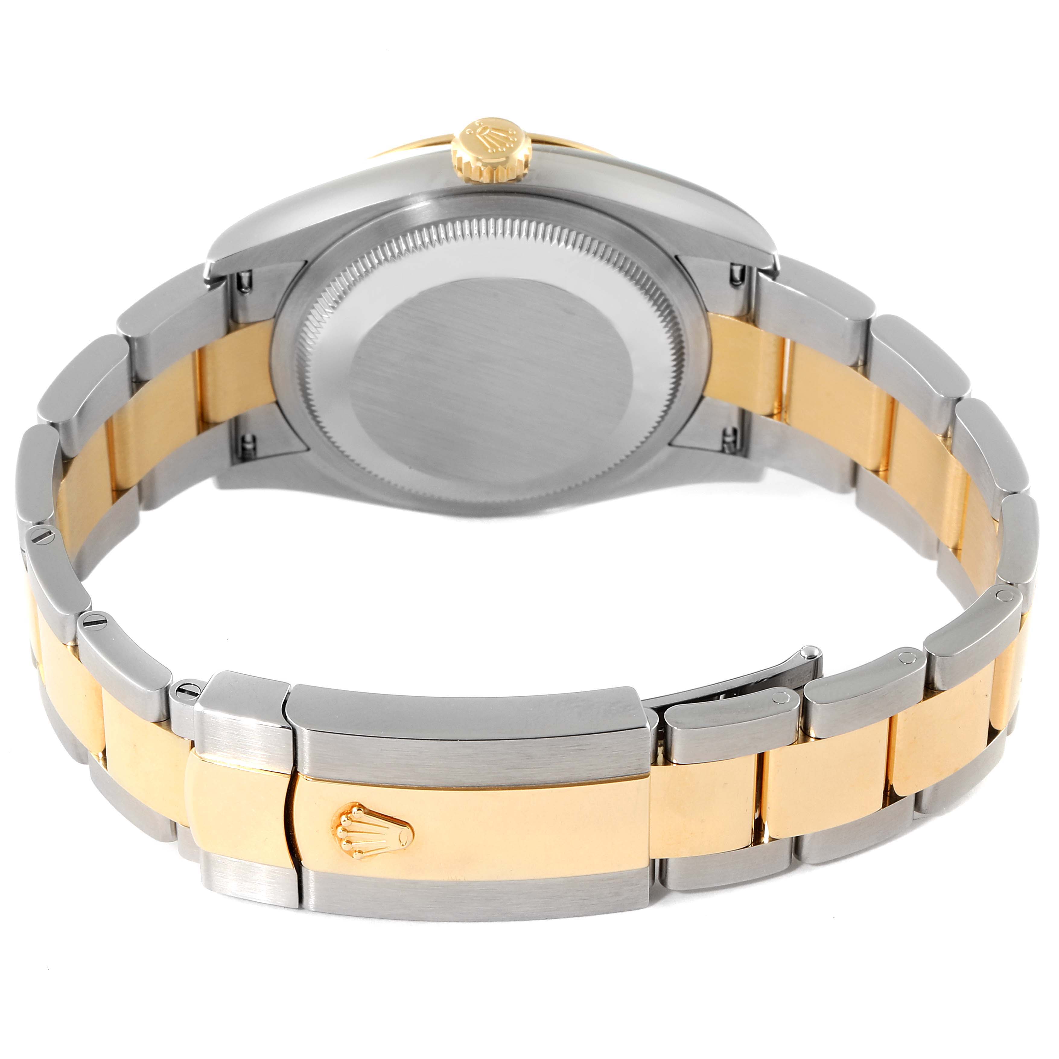 The image shows the back and bracelet of the Rolex Datejust 126203 Men's Steel and Gold (two tone) Mother of Pearl Dial 126203 Men's Steel and Gold (two tone) Mother of Pearl Dial watch, highlighting its two-tone metal design.