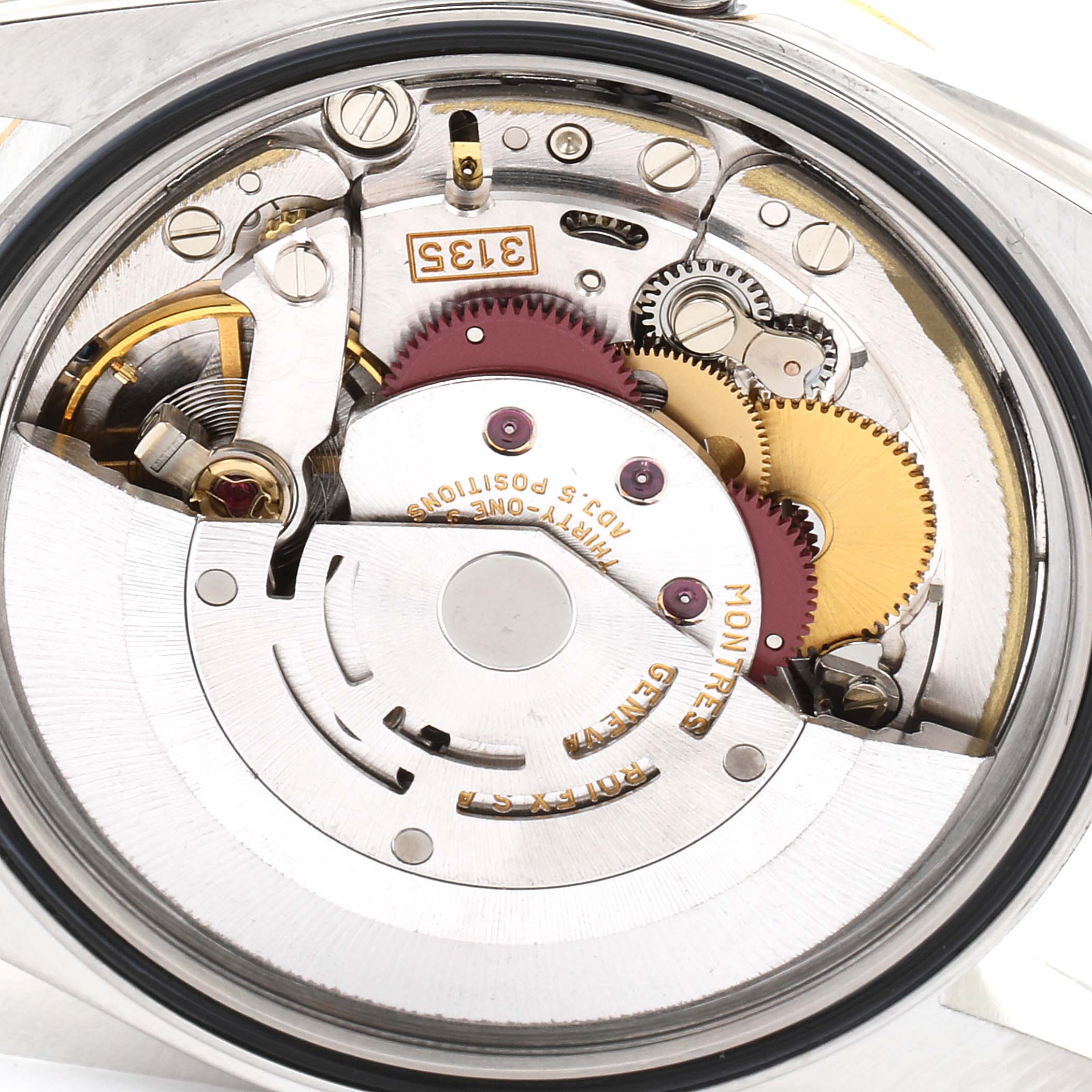 The image shows the movement and internal mechanism of a Rolex Datejust 16233 Men's Steel and Gold (two tone) Silver Dial 16233 Men's Steel and Gold (two tone) Silver Dial watch from a back angle.