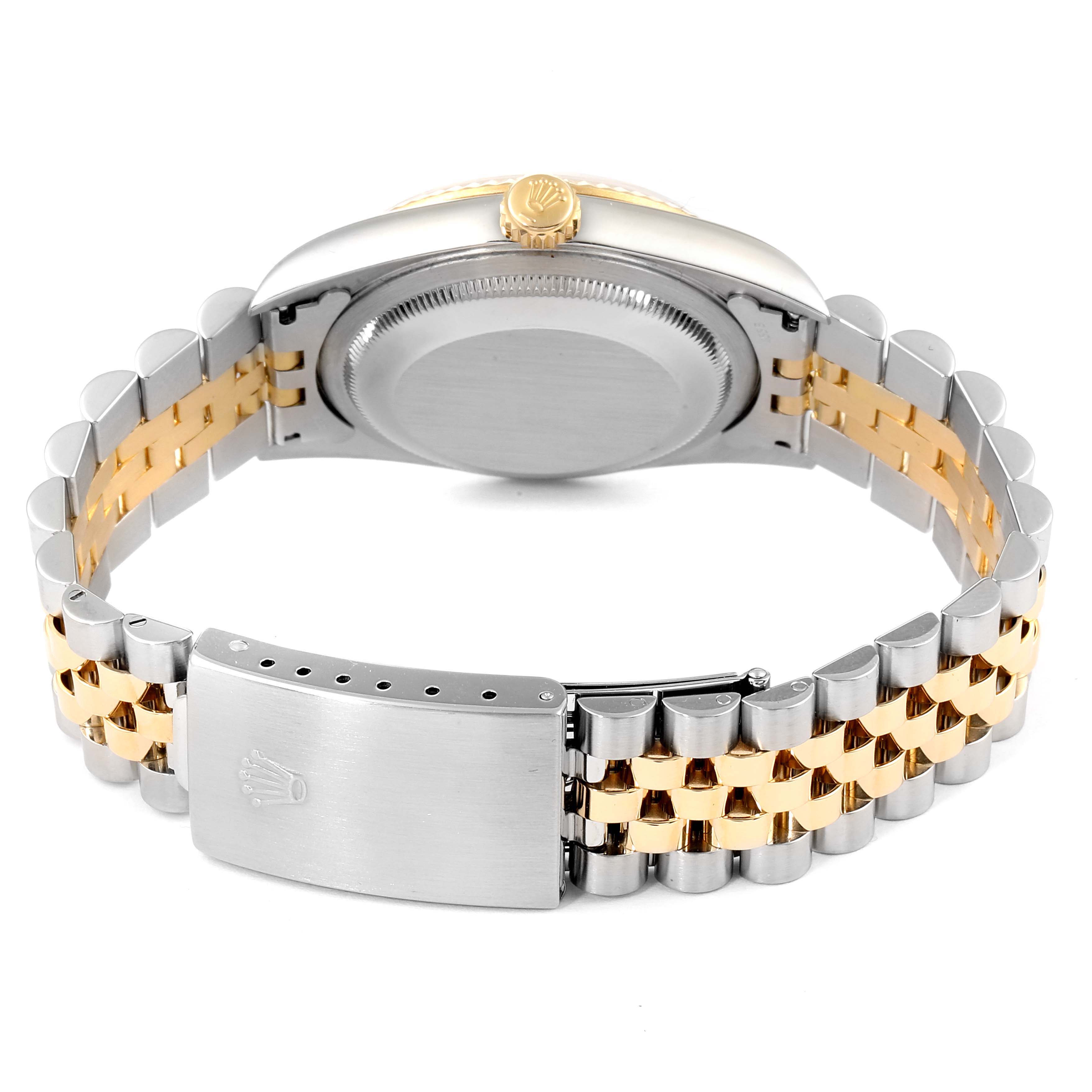 The image shows the back of the Rolex Datejust 16233 Men's Steel and Gold (two tone) Silver Dial 16233 Men's Steel and Gold (two tone) Silver Dial watch, highlighting the case back, crown, and two-tone bracelet with a clasp.