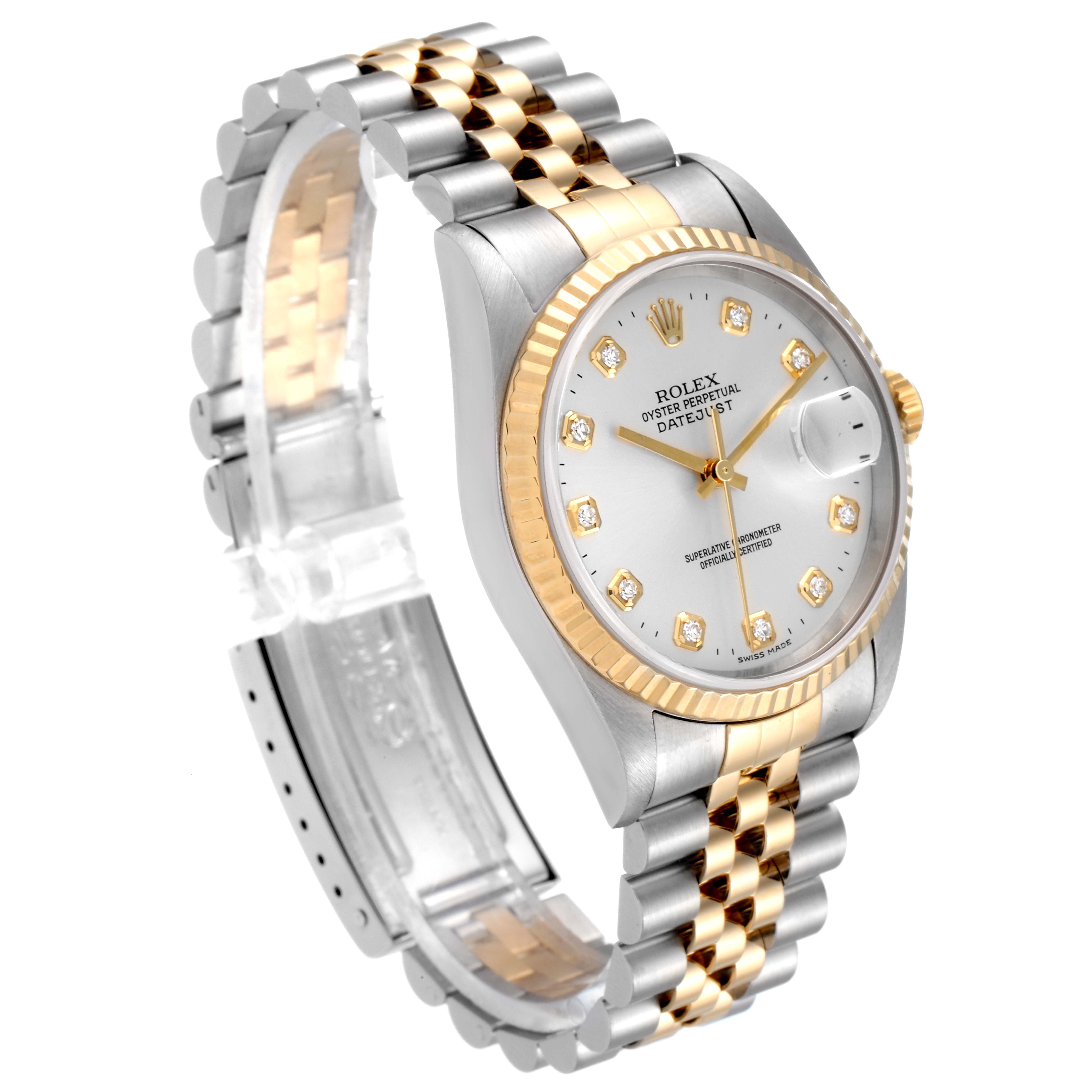 The Rolex Datejust 16233 Men's Steel and Gold (two tone) Silver Dial 16233 Men's Steel and Gold (two tone) Silver Dial watch is shown at an angled side view, displaying its face, bezel, crown, and jubilee bracelet.