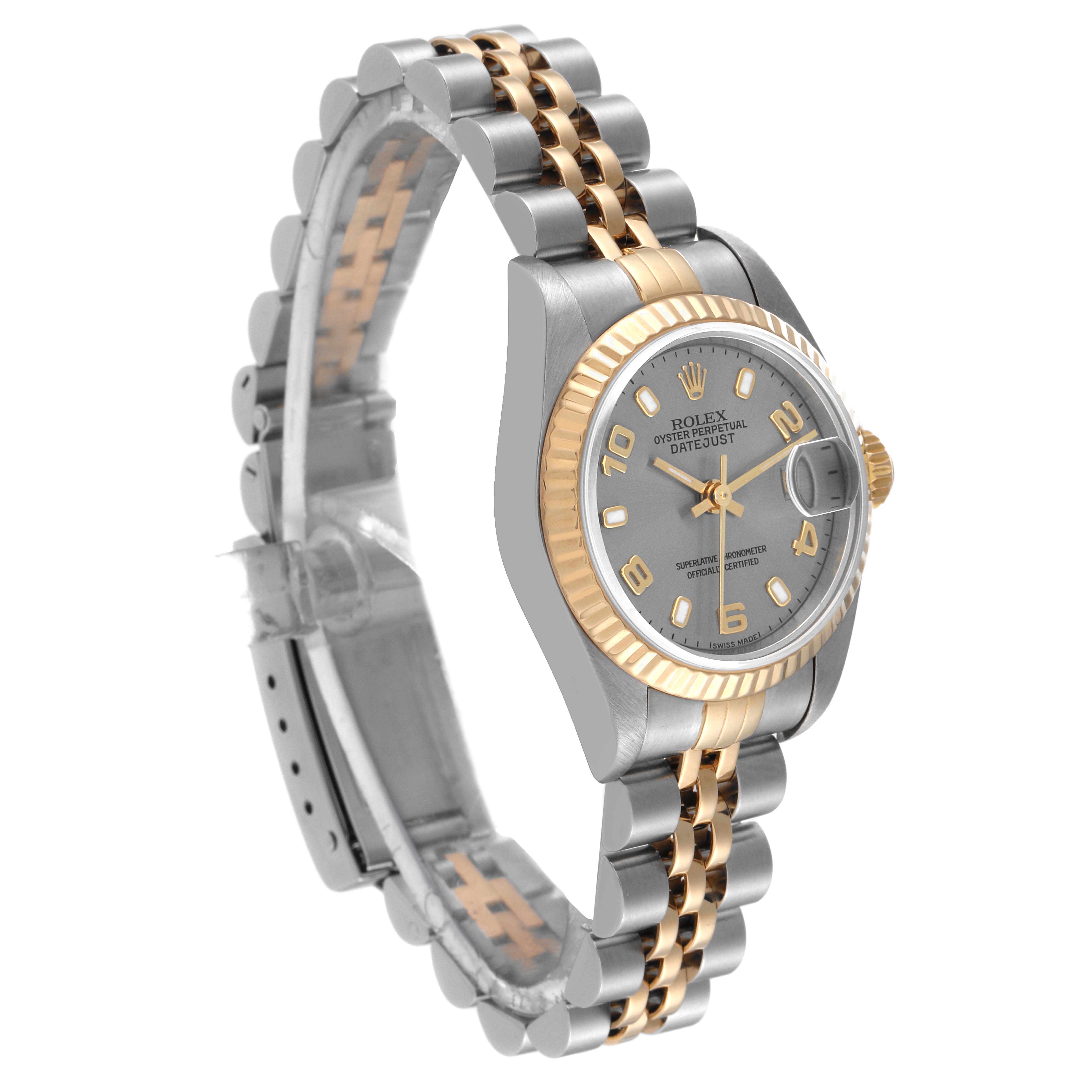 The image shows a side angle of a Rolex Datejust 79173 Women's Steel and Gold (two tone) Grey Dial 79173 Women's Steel and Gold (two tone) Grey Dial watch displaying the face, bezel, and two-tone bracelet.