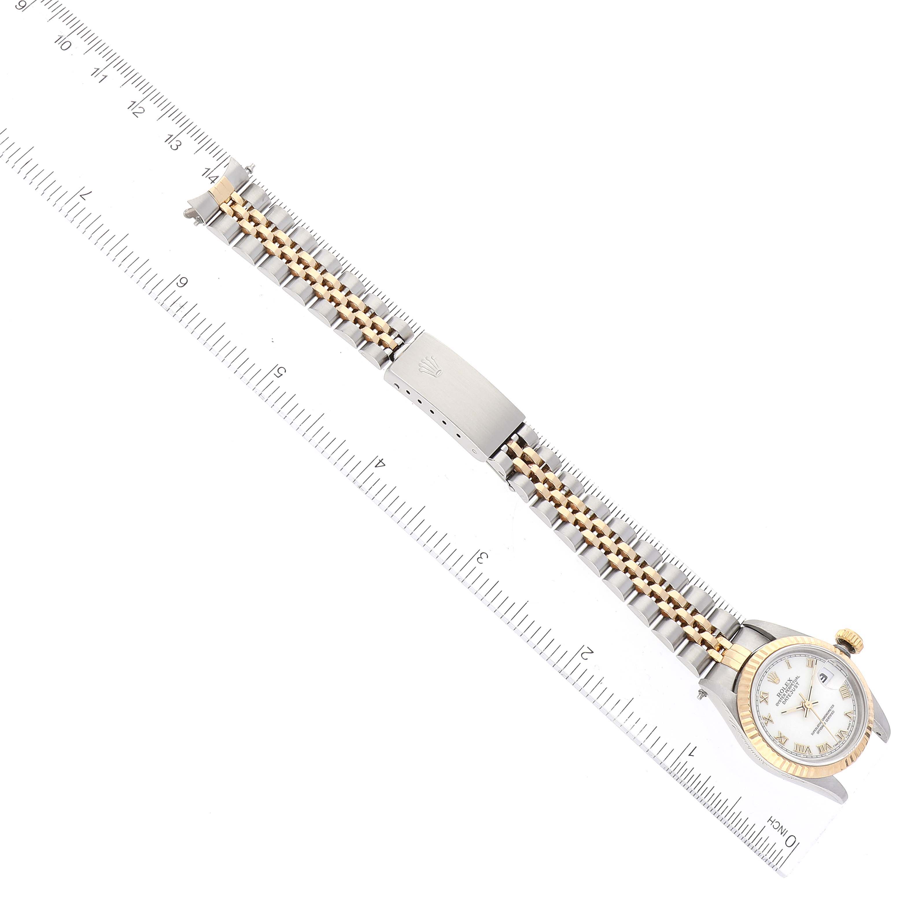 The image shows a Rolex Datejust 69173 Women's Steel and Gold (two tone) White Dial 69173 Women's Steel and Gold (two tone) White Dial watch with its bracelet fully extended, laid out flat against a ruler for measurement.