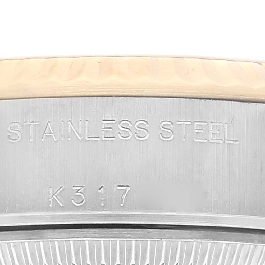 The image shows a close-up of the case back of a Rolex Datejust 79173 Women's Steel and Gold (two tone) White Dial 79173 Women's Steel and Gold (two tone) White Dial watch, displaying the "STAINLESS STEEL" engraving.