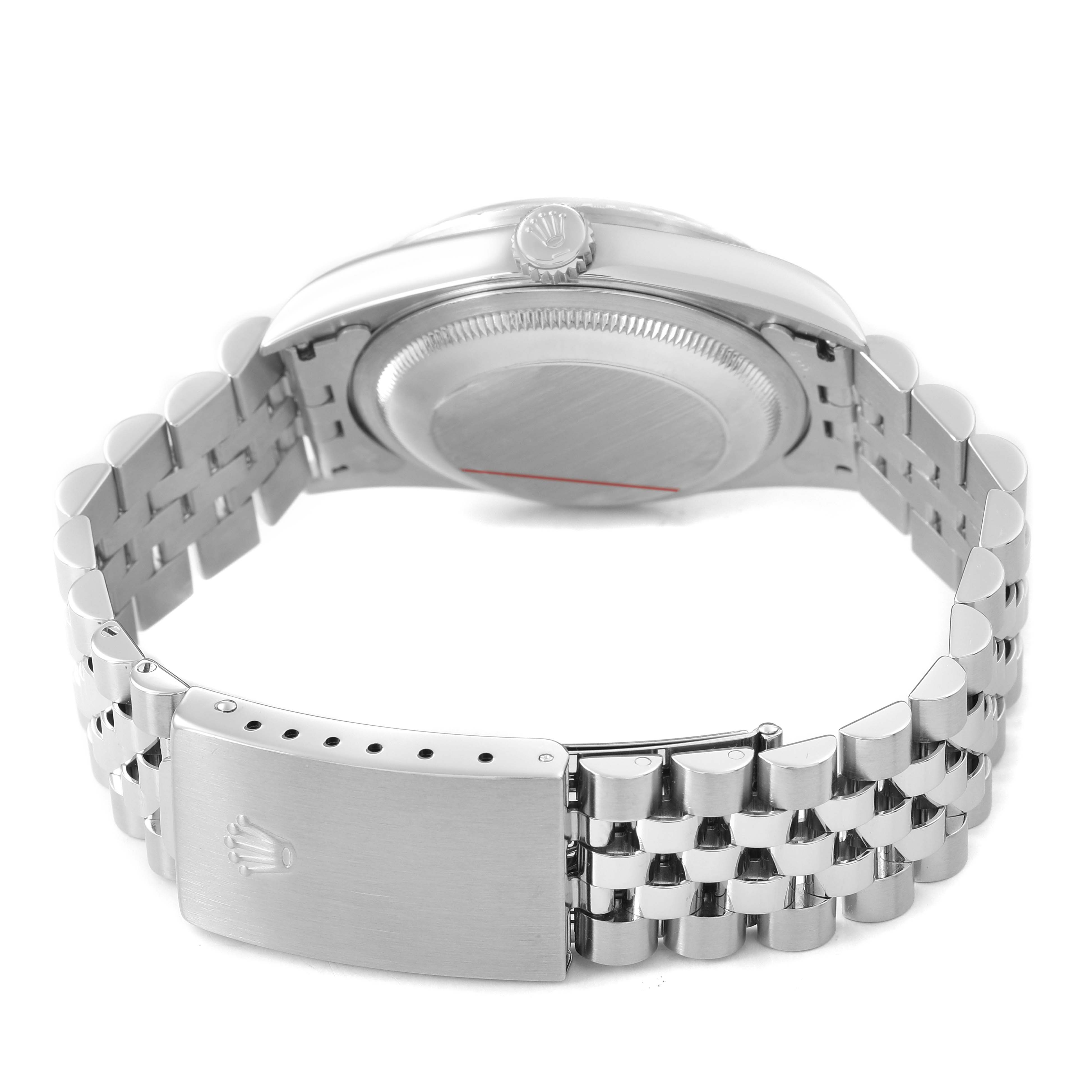 The image shows the back of a Rolex Datejust 16220 Men's Stainless Steel White Dial watch, highlighting the case, crown, and Jubilee bracelet with clasp.