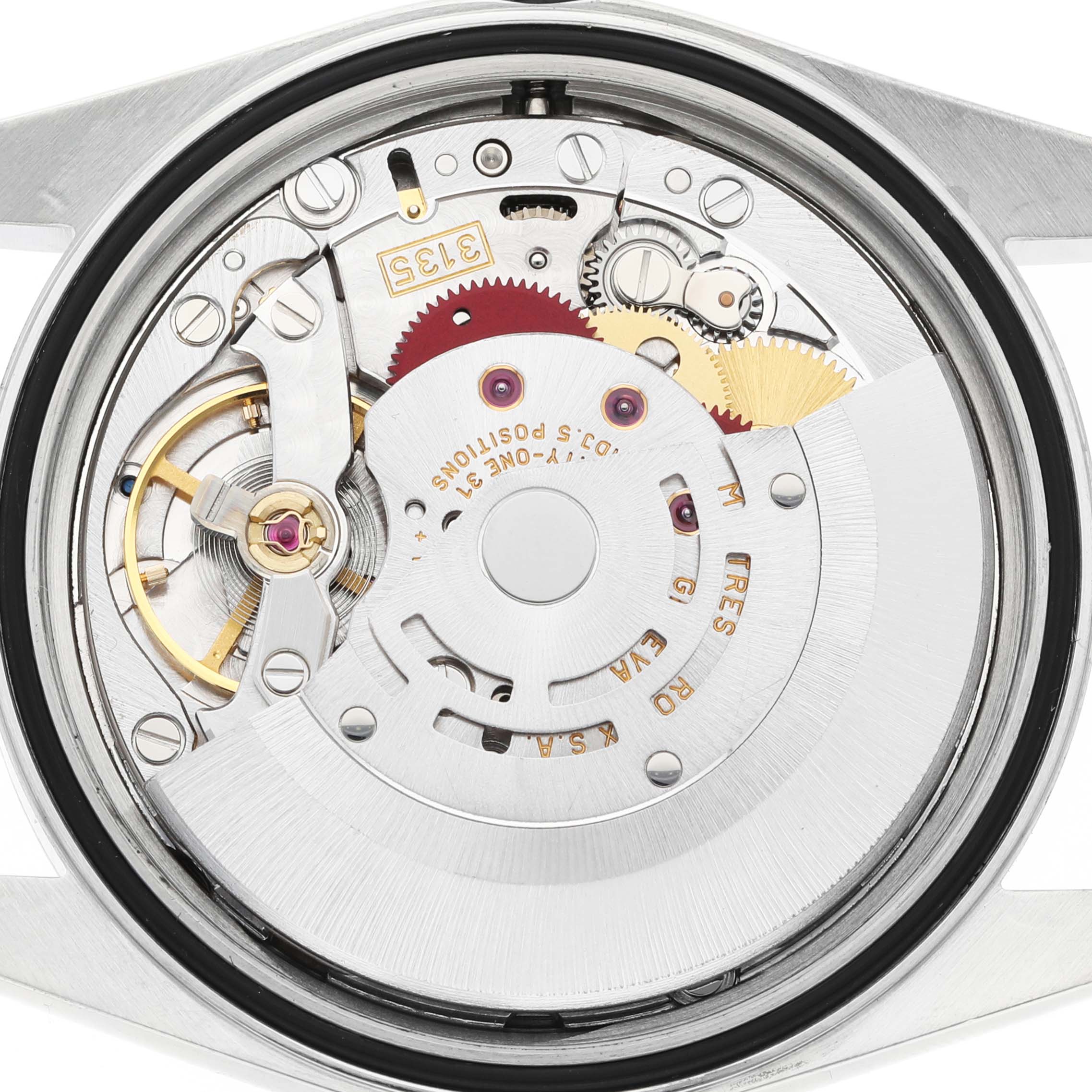 The image shows the intricate movement of a Rolex Datejust 16220 Men's Stainless Steel White Dial, focusing on gears and components from an angle inside the caseback.
