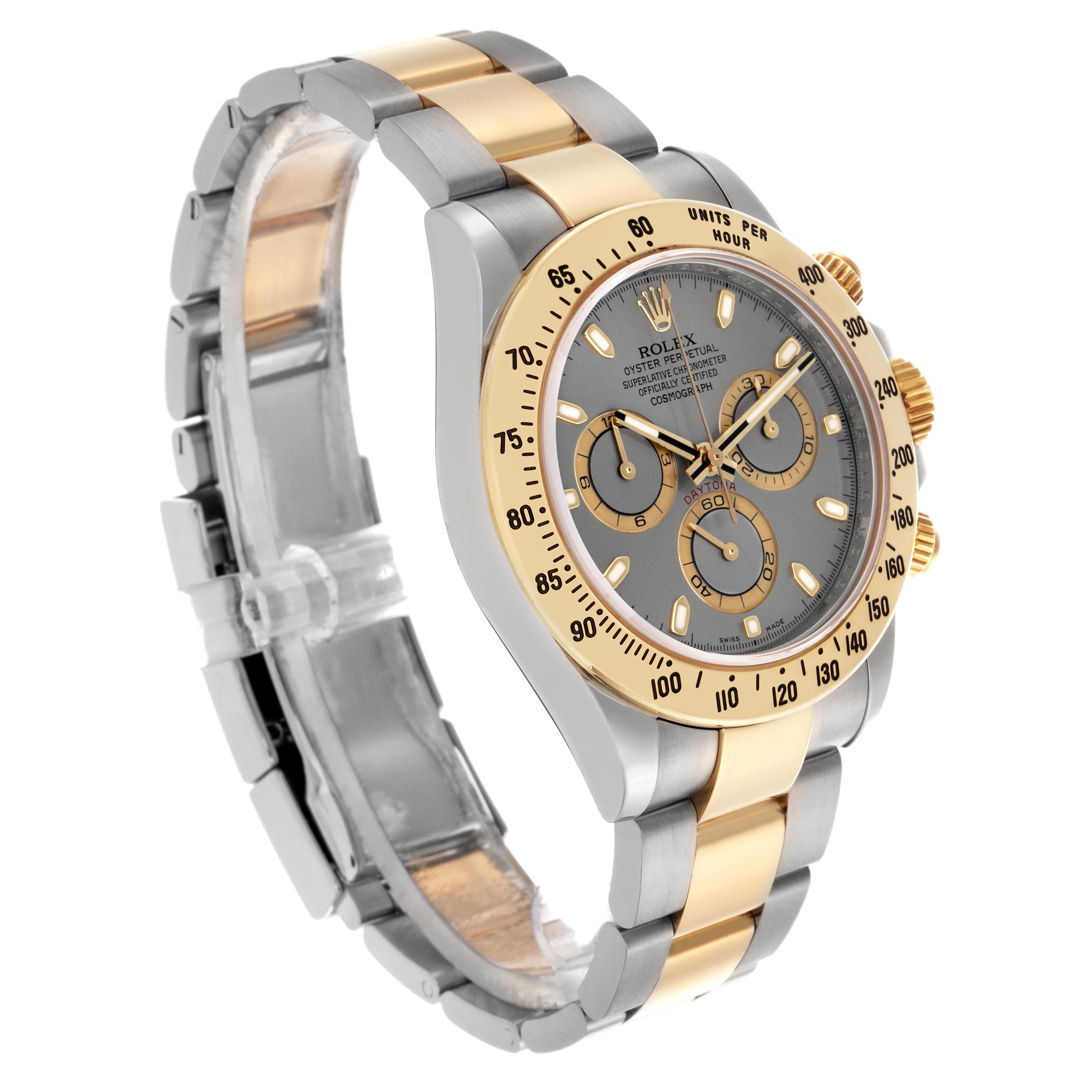 The Rolex Daytona 116523 Men's Steel and Gold (two tone) Grey Dial 116523 Men's Steel and Gold (two tone) Grey Dial watch is shown at a three-quarter angle, highlighting its two-tone bracelet, bezel, and chronograph dials.