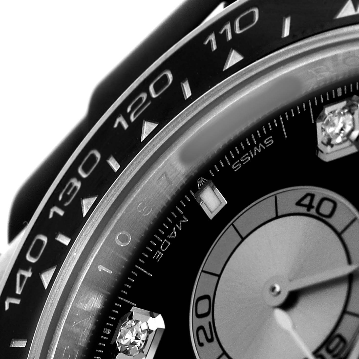 The image shows a close-up of the Rolex Daytona 126519 Men's White Gold Black Dial watch, focusing on the bezel, sub-dial, and diamond hour markers.