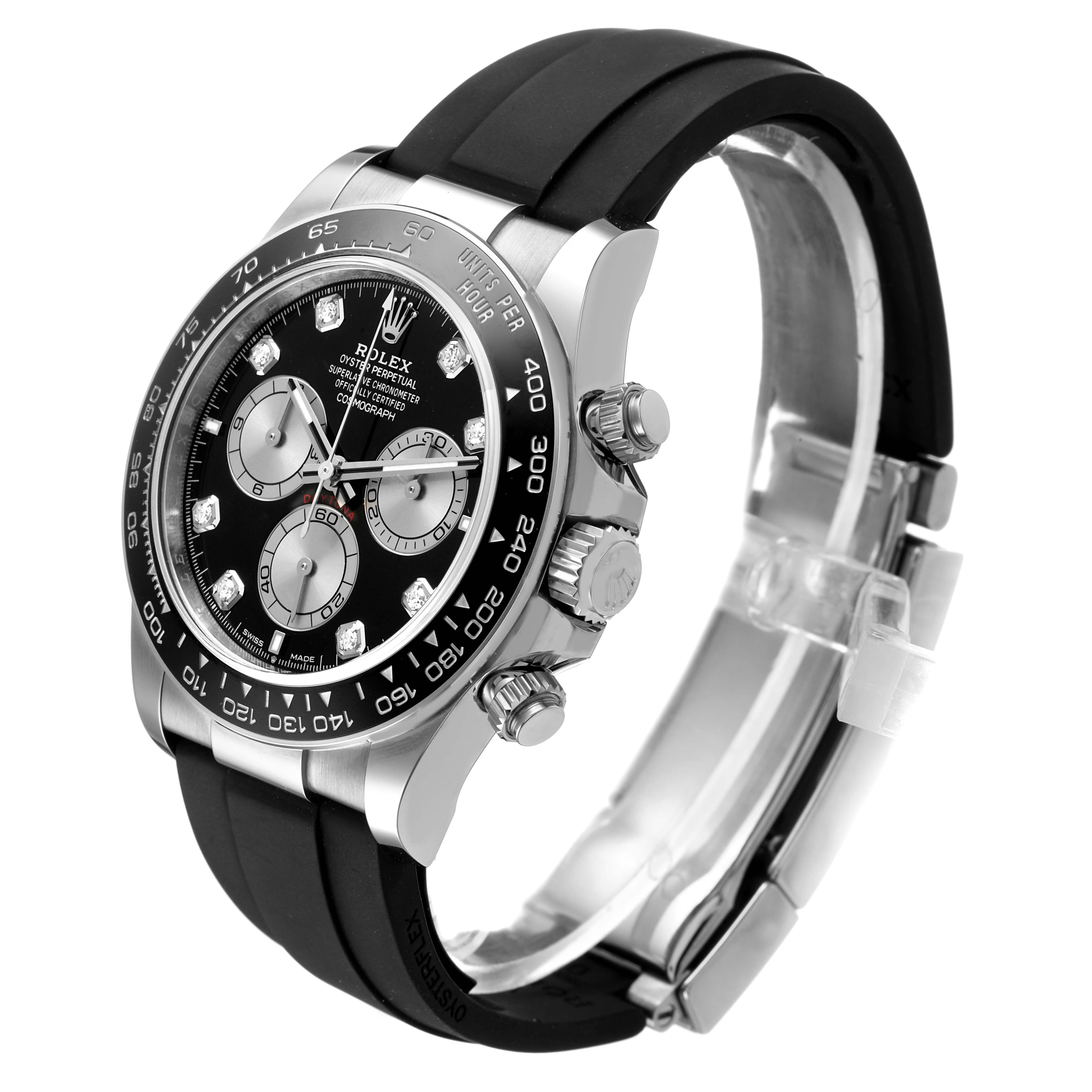The Rolex Daytona 126519 Men's White Gold Black Dial watch is shown at an angled side view, displaying the bezel, dial, chronograph sub-dials, and rubber strap.