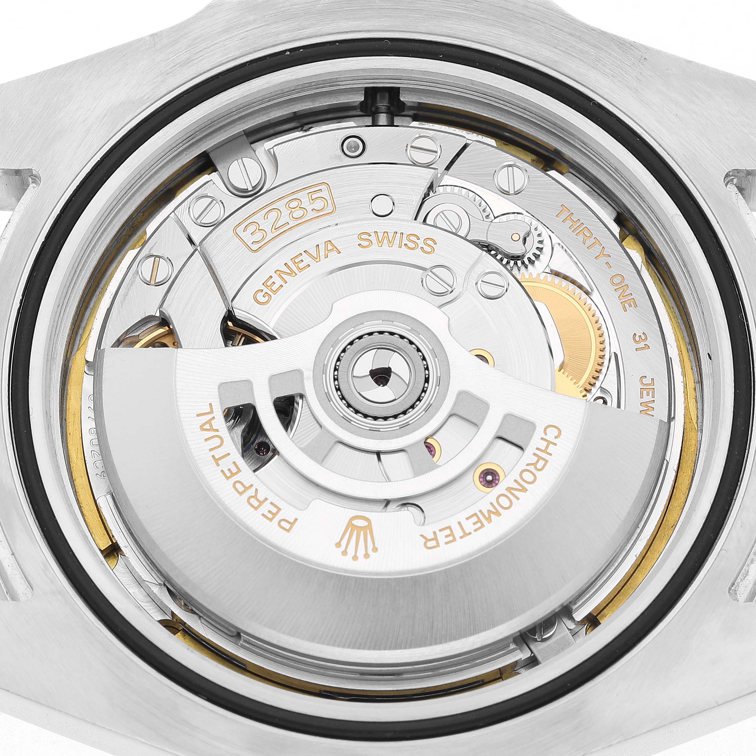 The image shows the movement of a Rolex Explorer 226570 Men's Stainless Steel Black Dial watch, specifically the Caliber 3285, from a top-down angle.