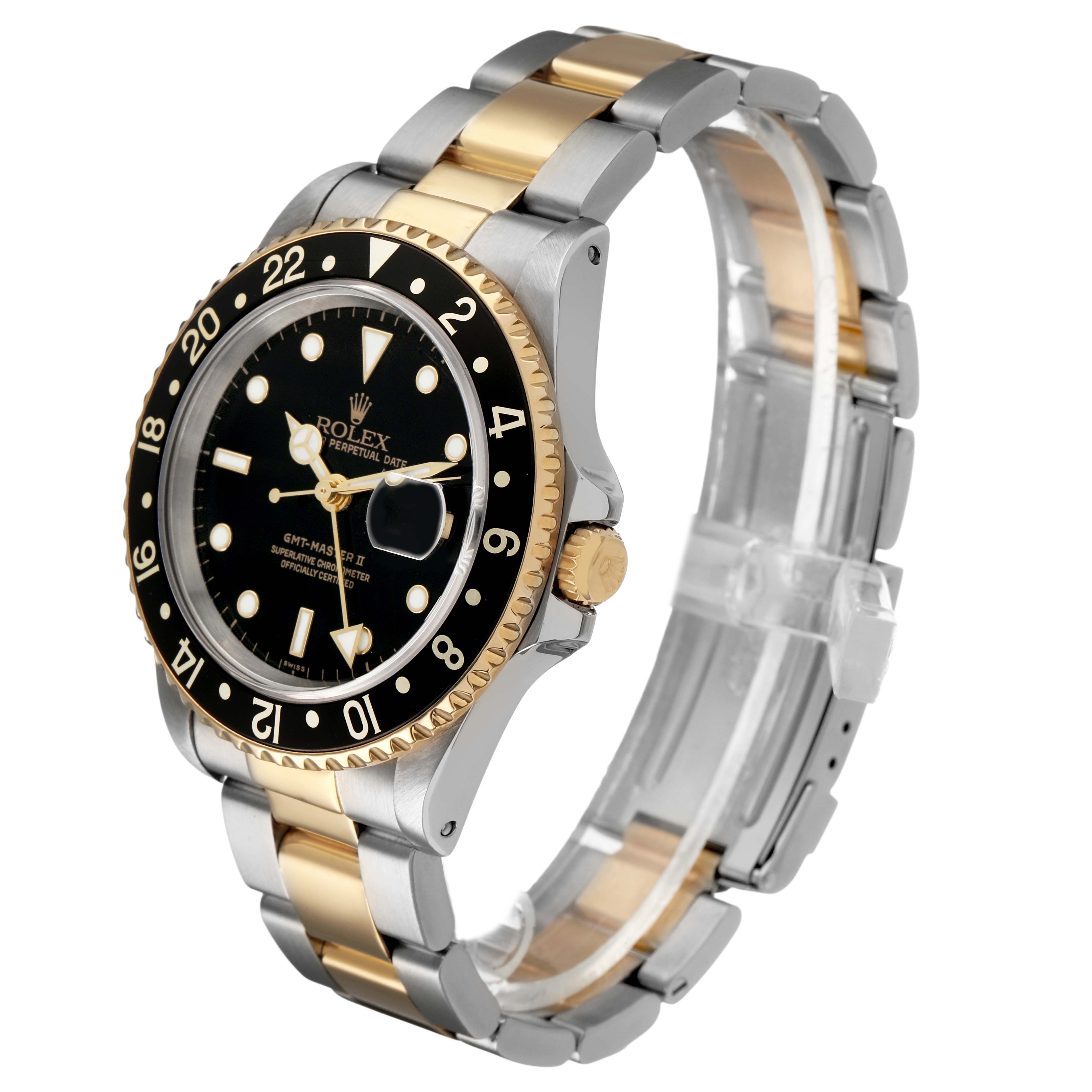 The Rolex GMT-Master 16713LN Men's Steel and Gold (two tone) Black Dial watch is shown at a three-quarter angle, highlighting its black and gold bezel, dial, and two-tone bracelet.