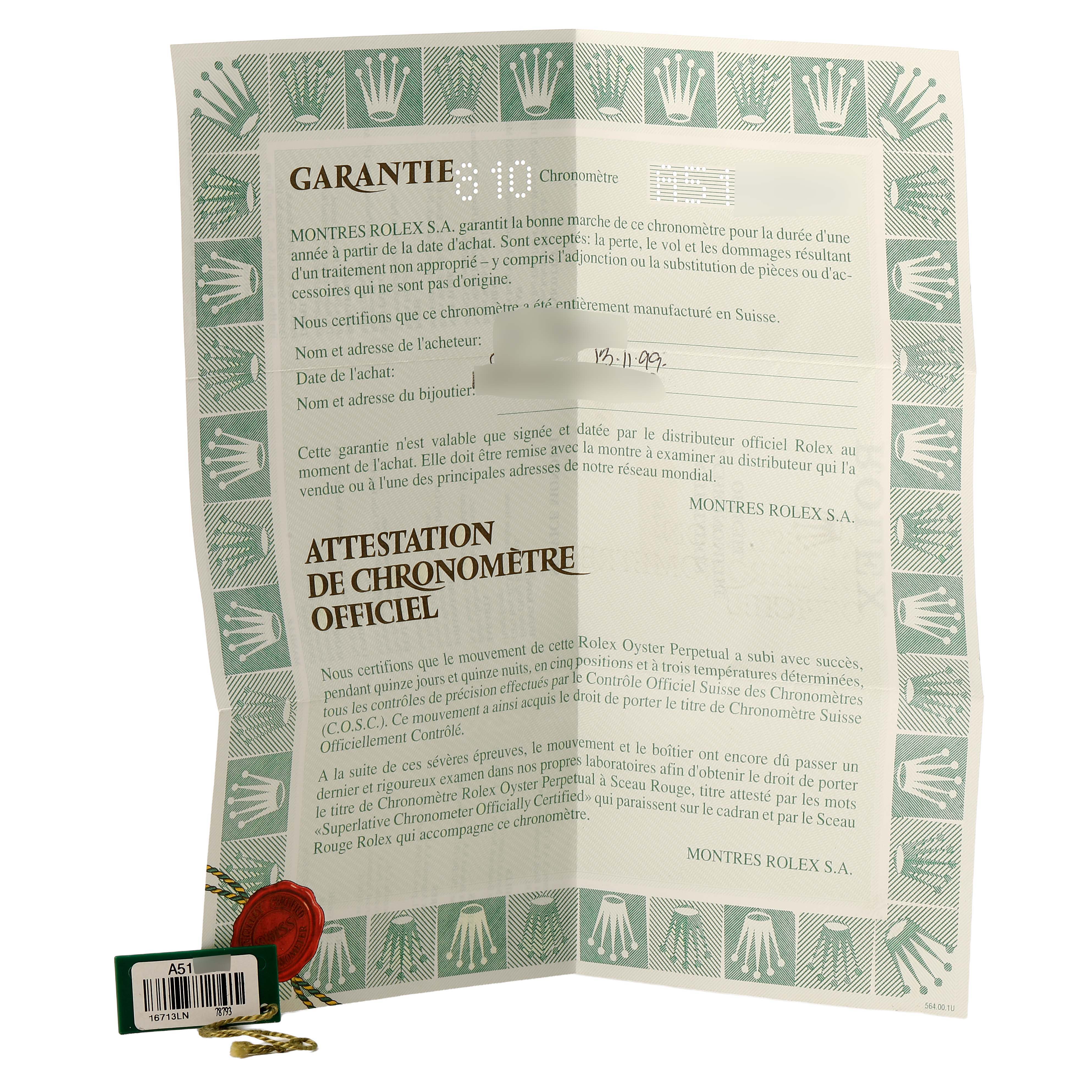 The image shows a warranty certificate and associated tags for a Rolex GMT-Master 16713LN Men's Steel and Gold (two tone) Black Dial watch, viewed from the front.